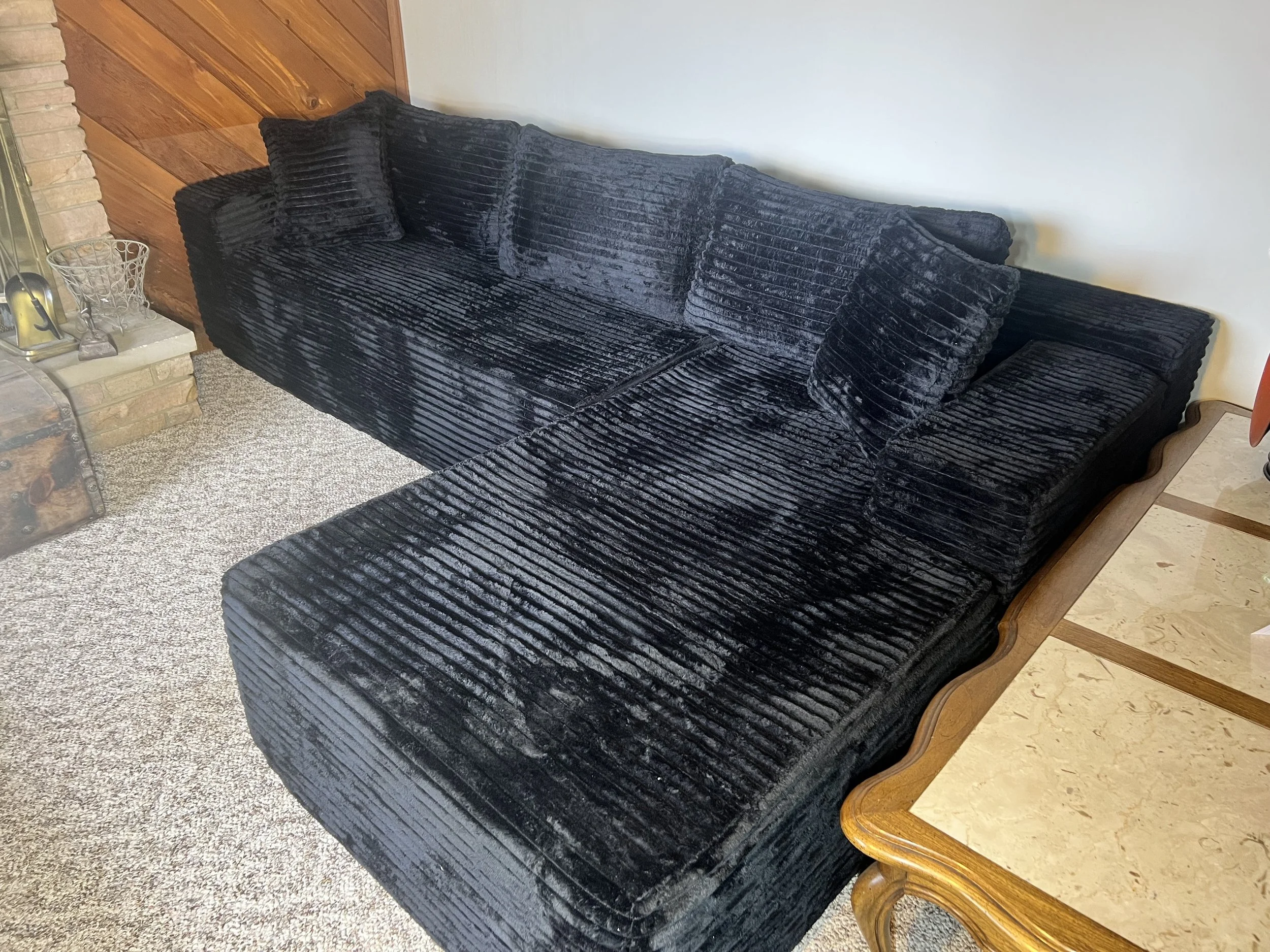 Charcoal grey corduroy sectional sofa—the perfect addition to a family room