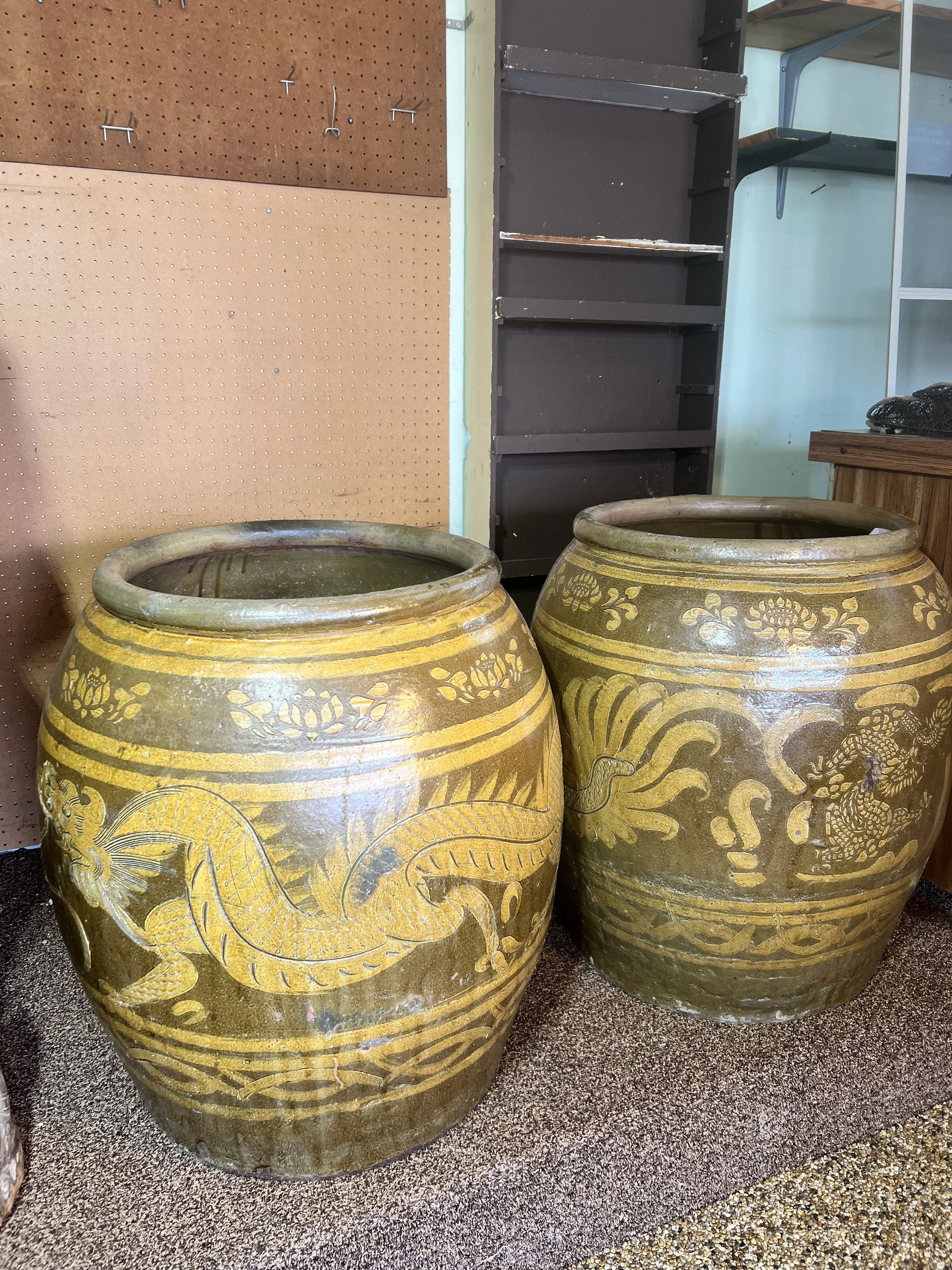 Pair of massive, spectacular Asian floor urns with golden embossed dragon motifs