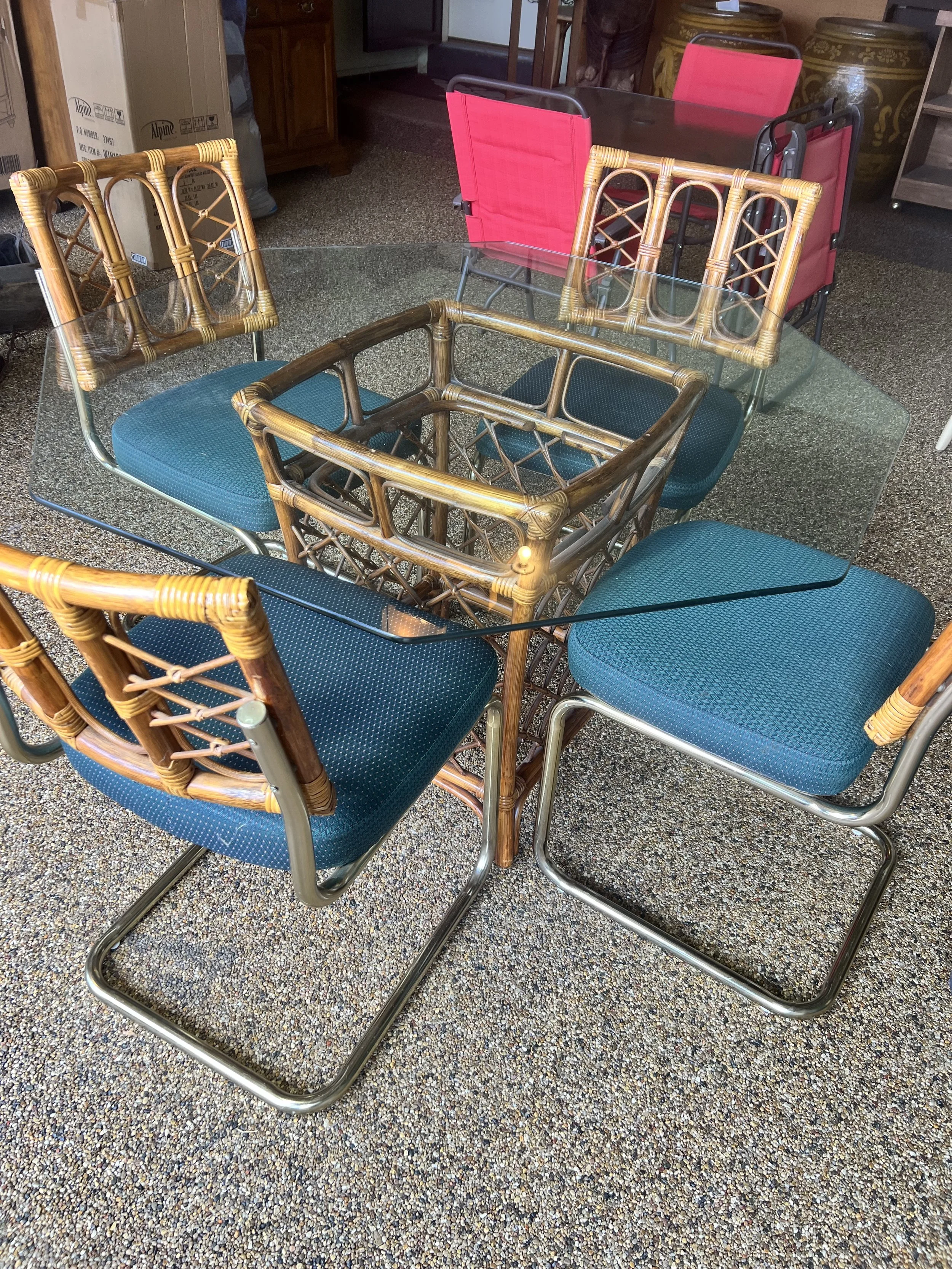 Mid-century modern bamboo and glass dining set with deep teal cushioned seats