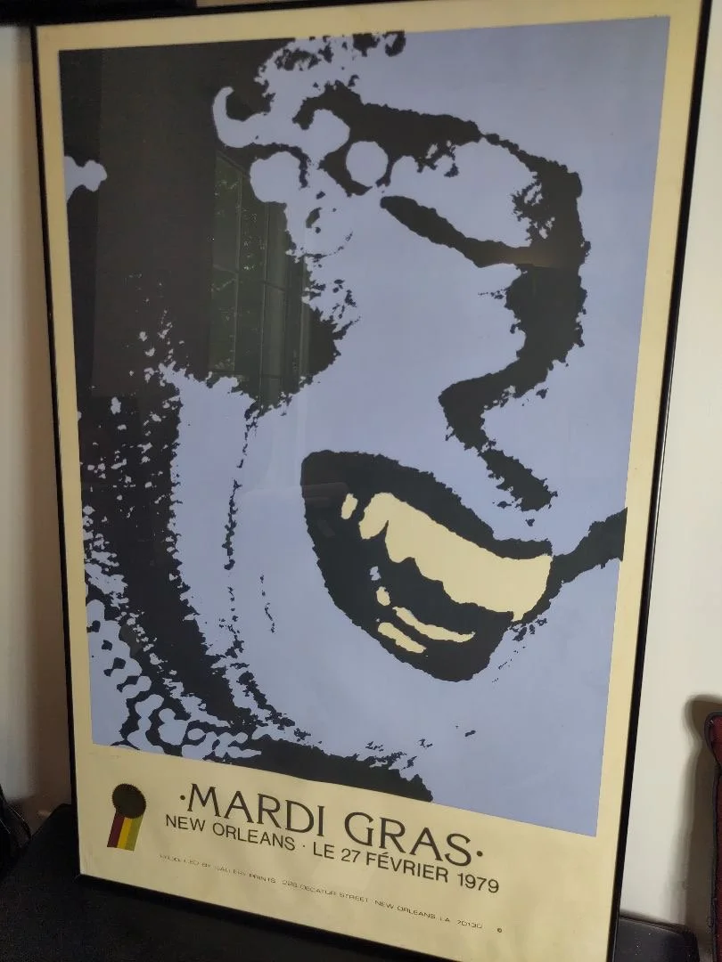 A framed 1979 New Orleans Mardi Gras print