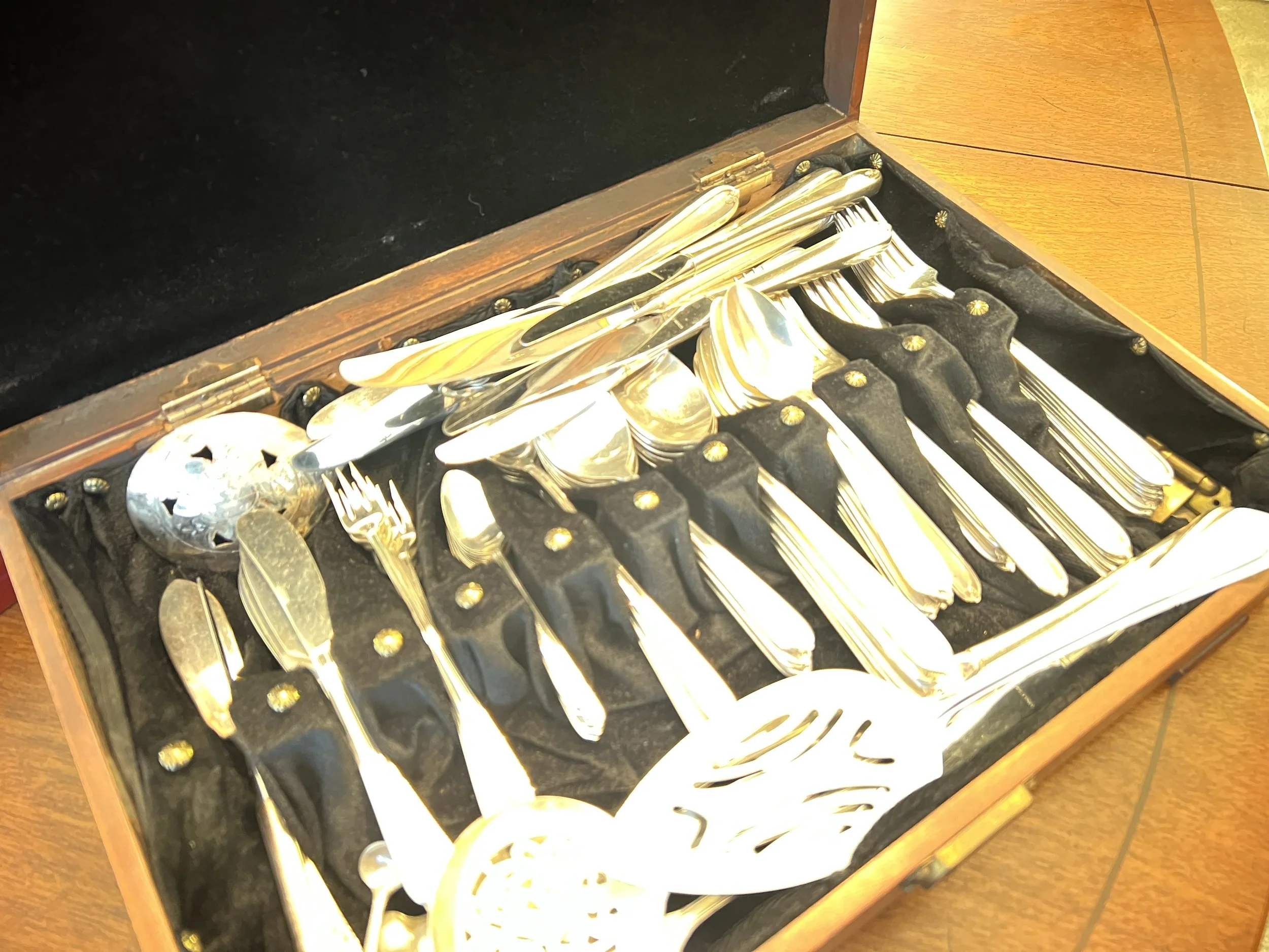 Flatware in wooden box