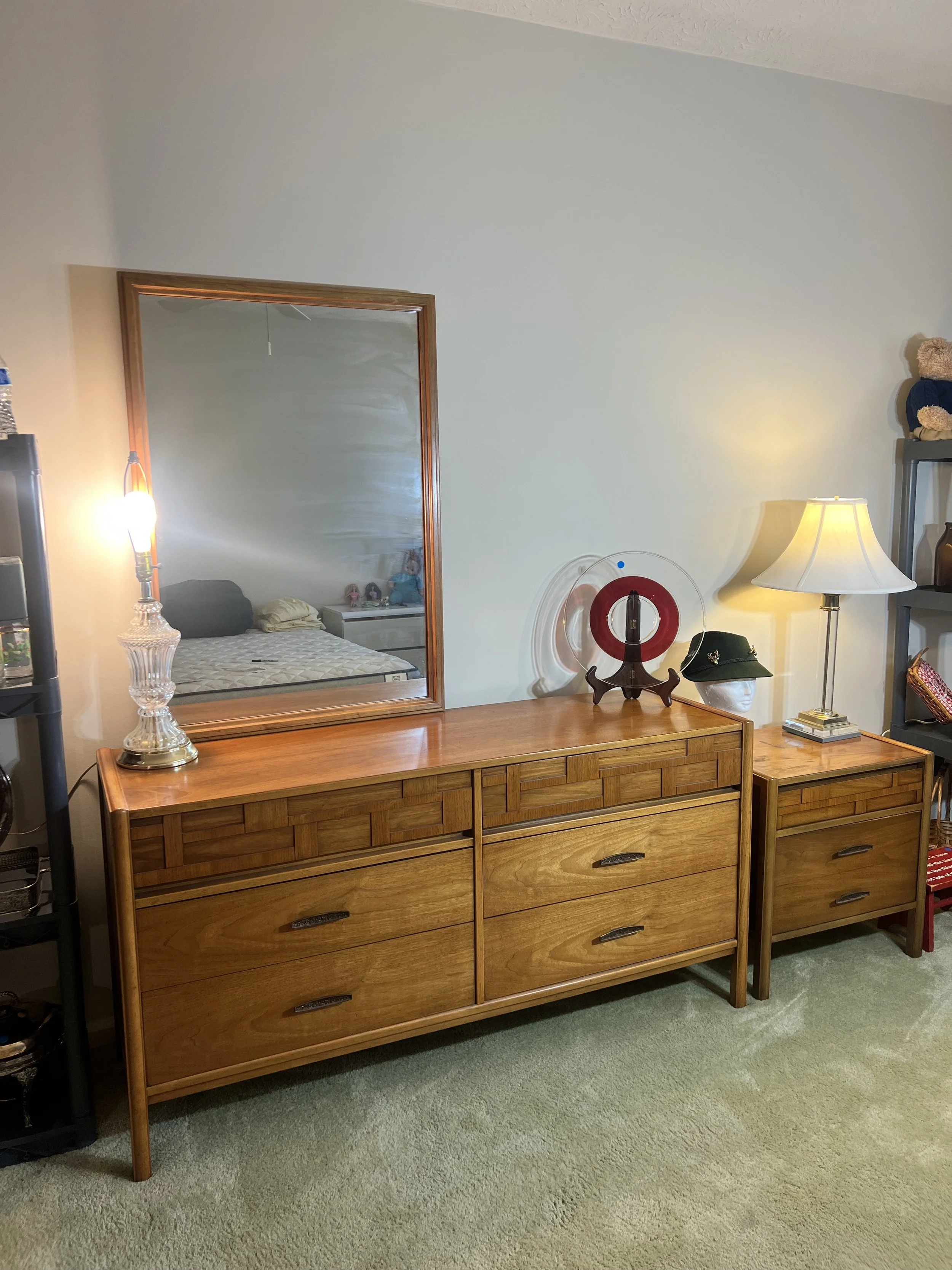 A stunning Mid-Century Modern double dresser featuring a distinctive woven wood facade on the top drawers and original brutalist-style hardware