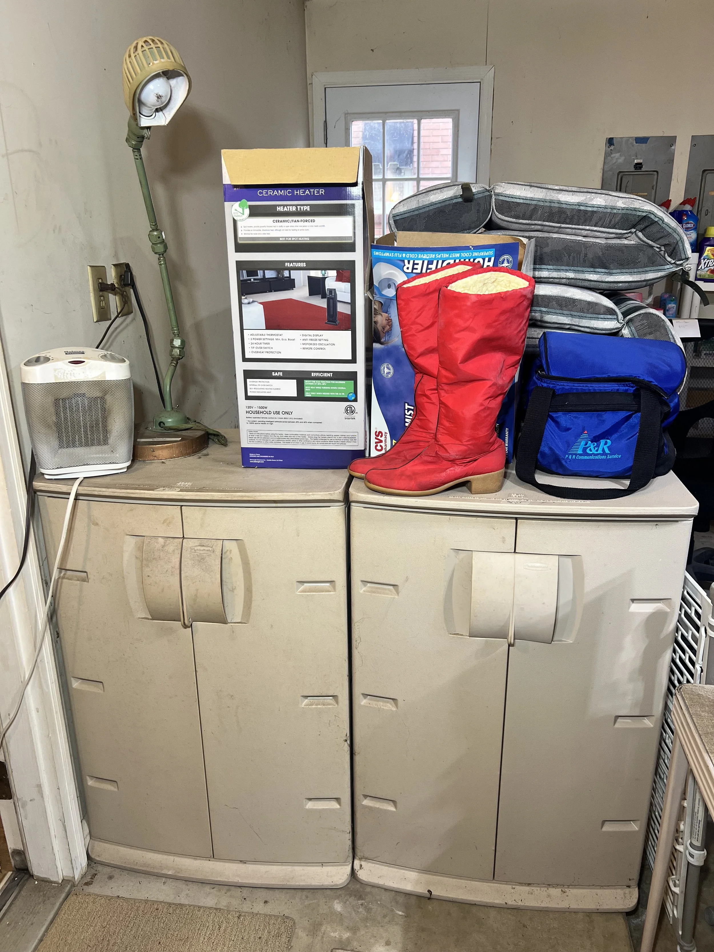 Storage: Two large tan Rubbermaid resin storage cabinets