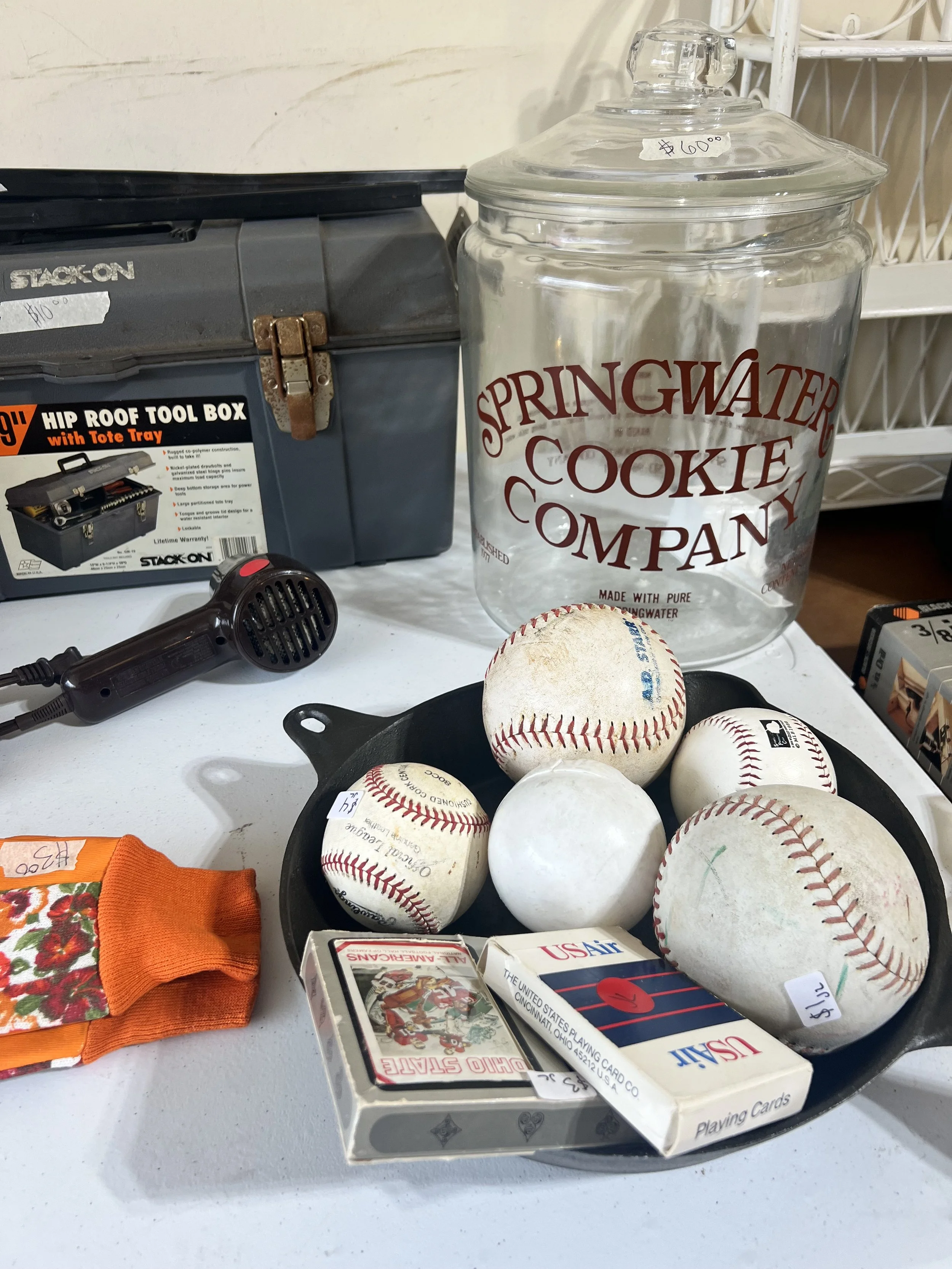 Vintage large Spingwater Cookie Company glass jar with lid, various baseballs, large cast iron pan