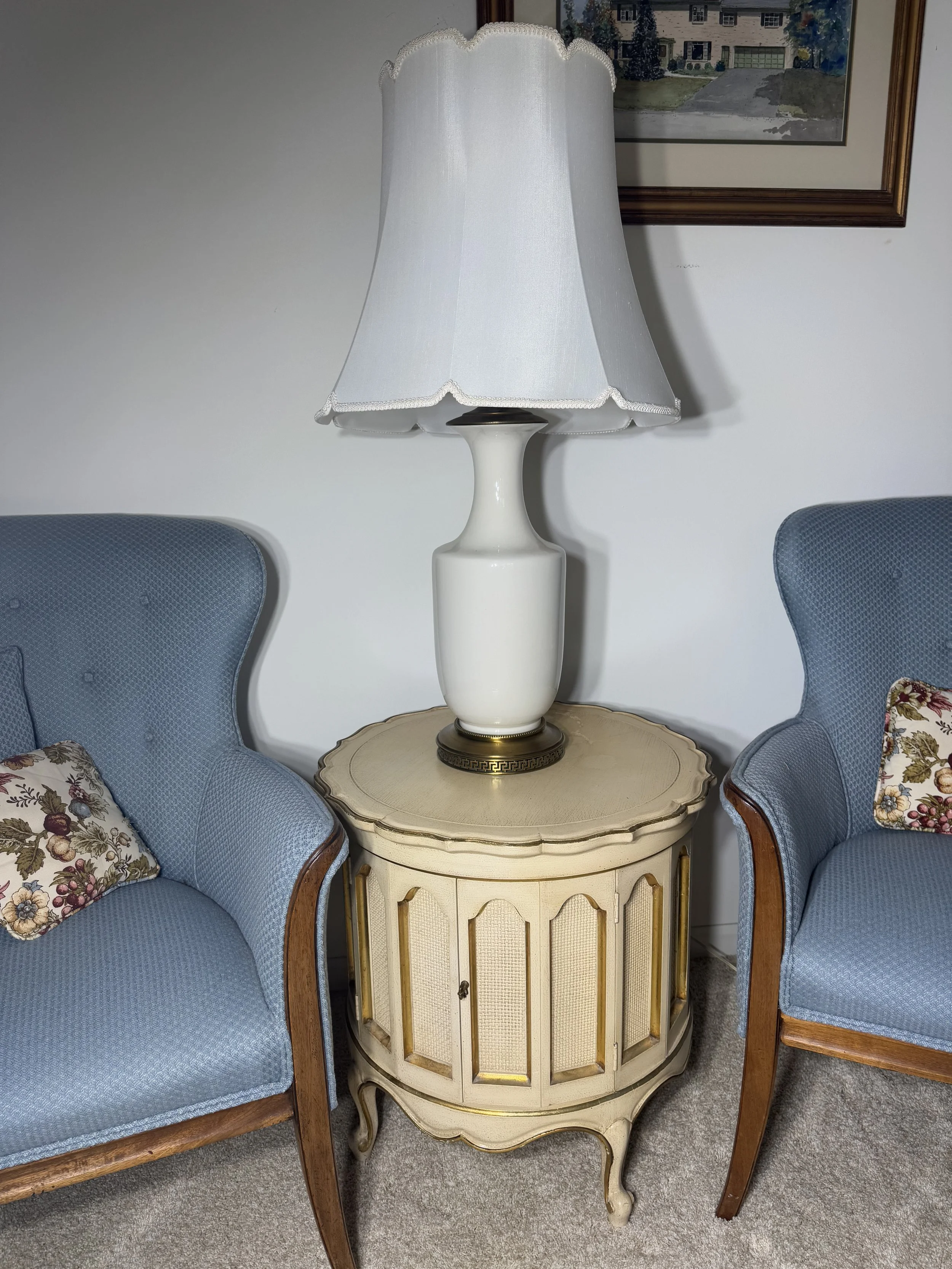 French provincial style round accent table with storage door and lamp