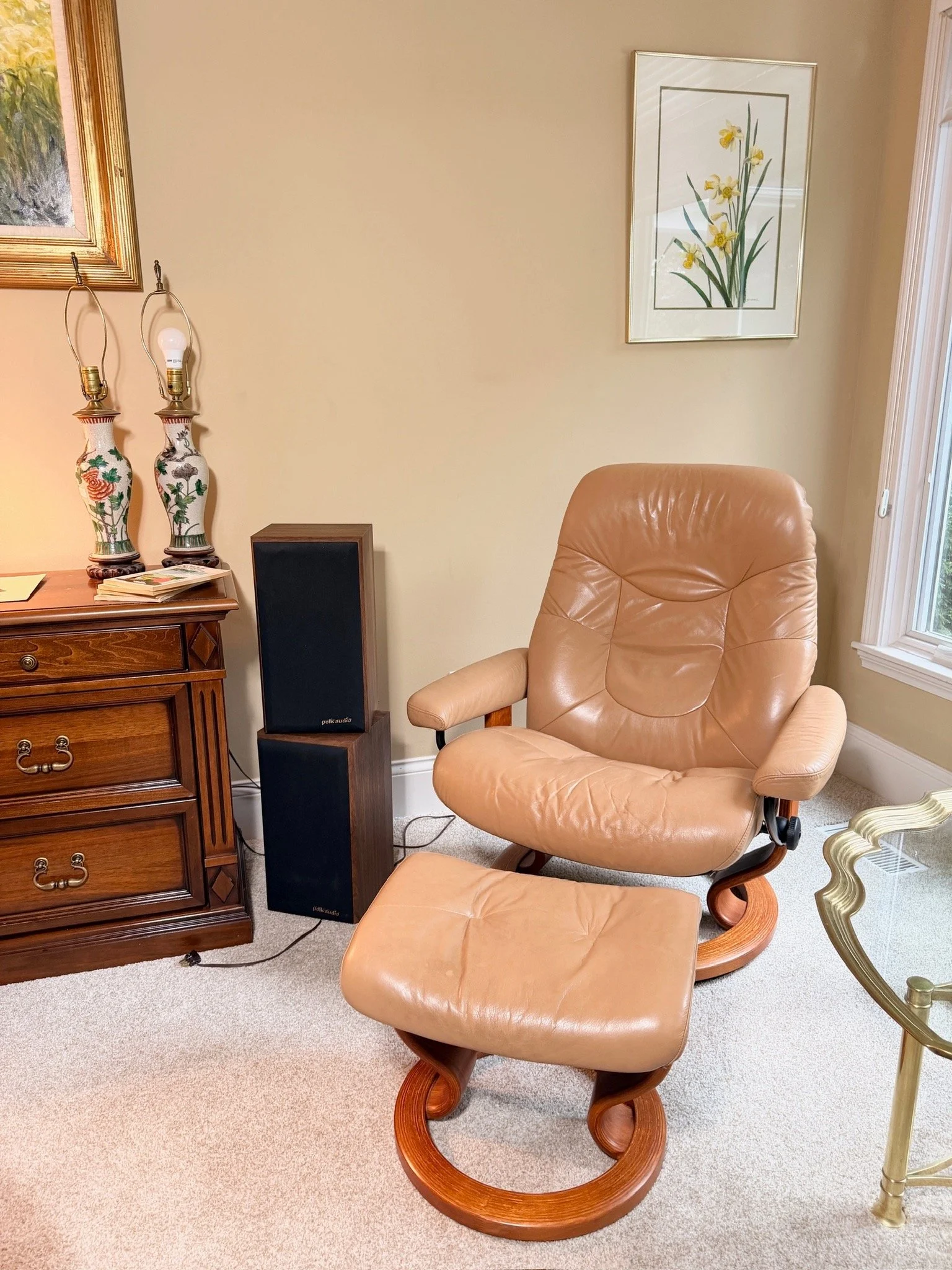 Ekornes Stressless tan leather swivel recliner with matching ottoman
