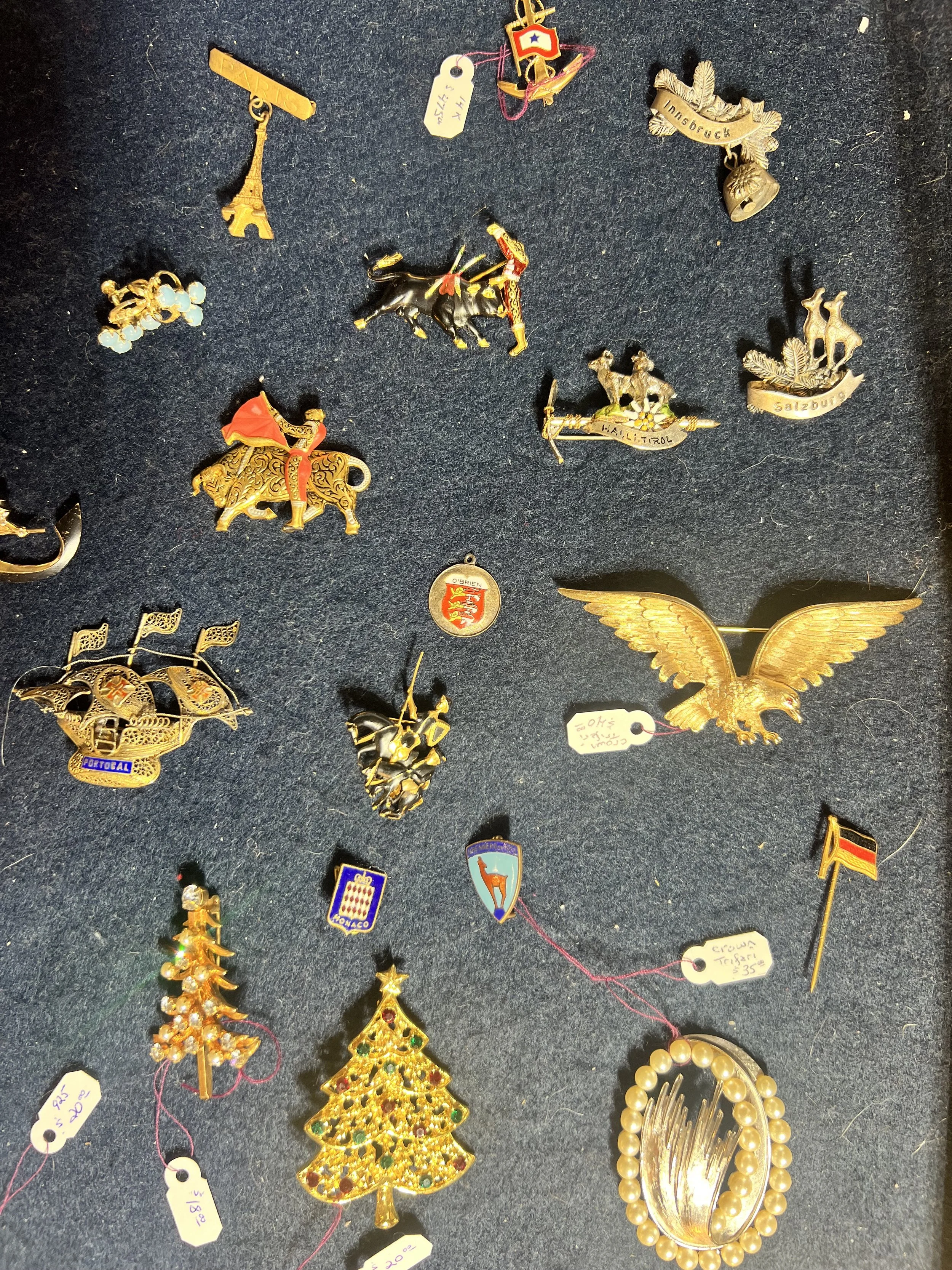 Jewelry: 14K gold chains, charms, bracelets, and vintage brooches