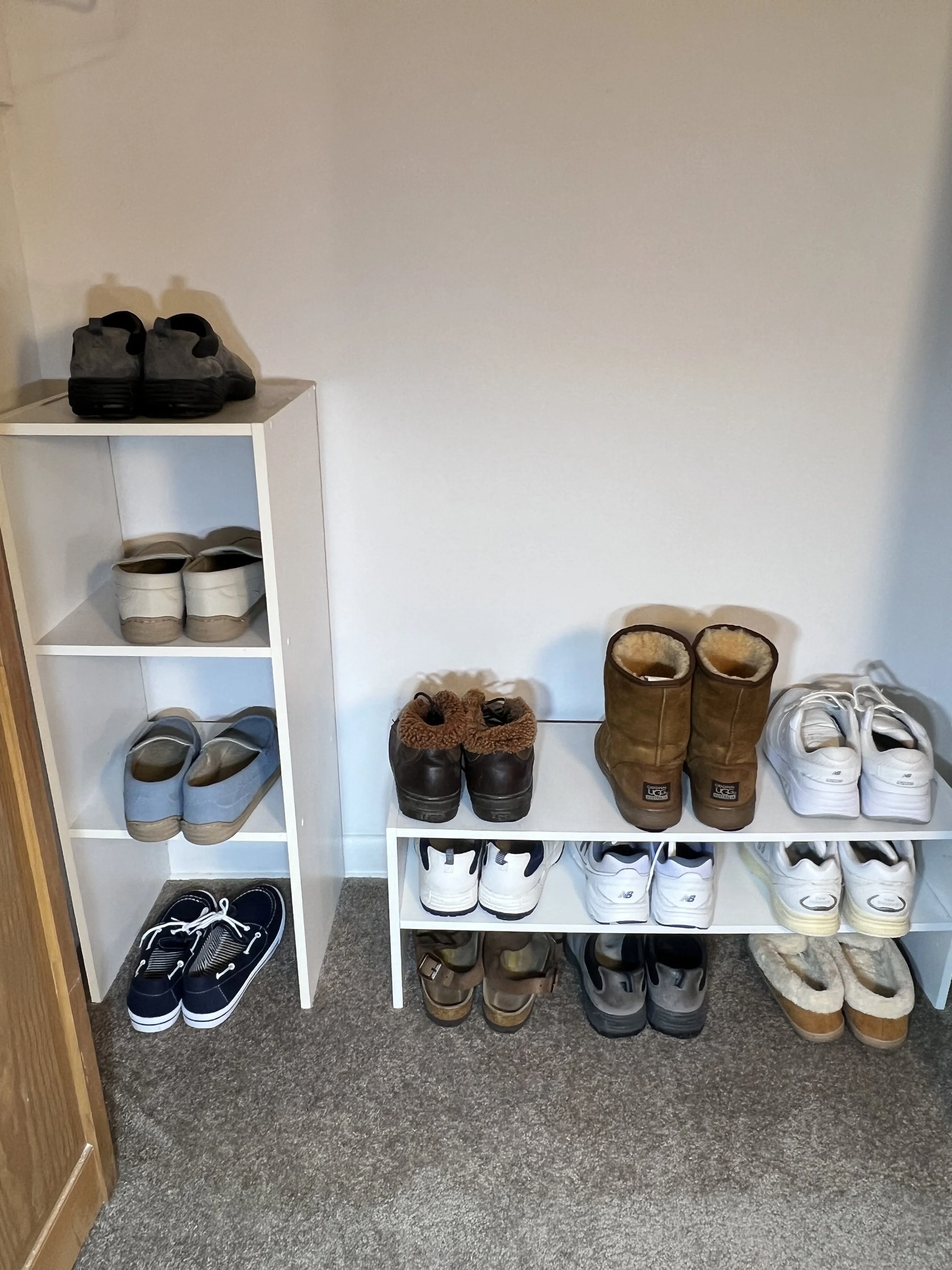 Collection of footwear including Ugg boots, sneakers, and sandals