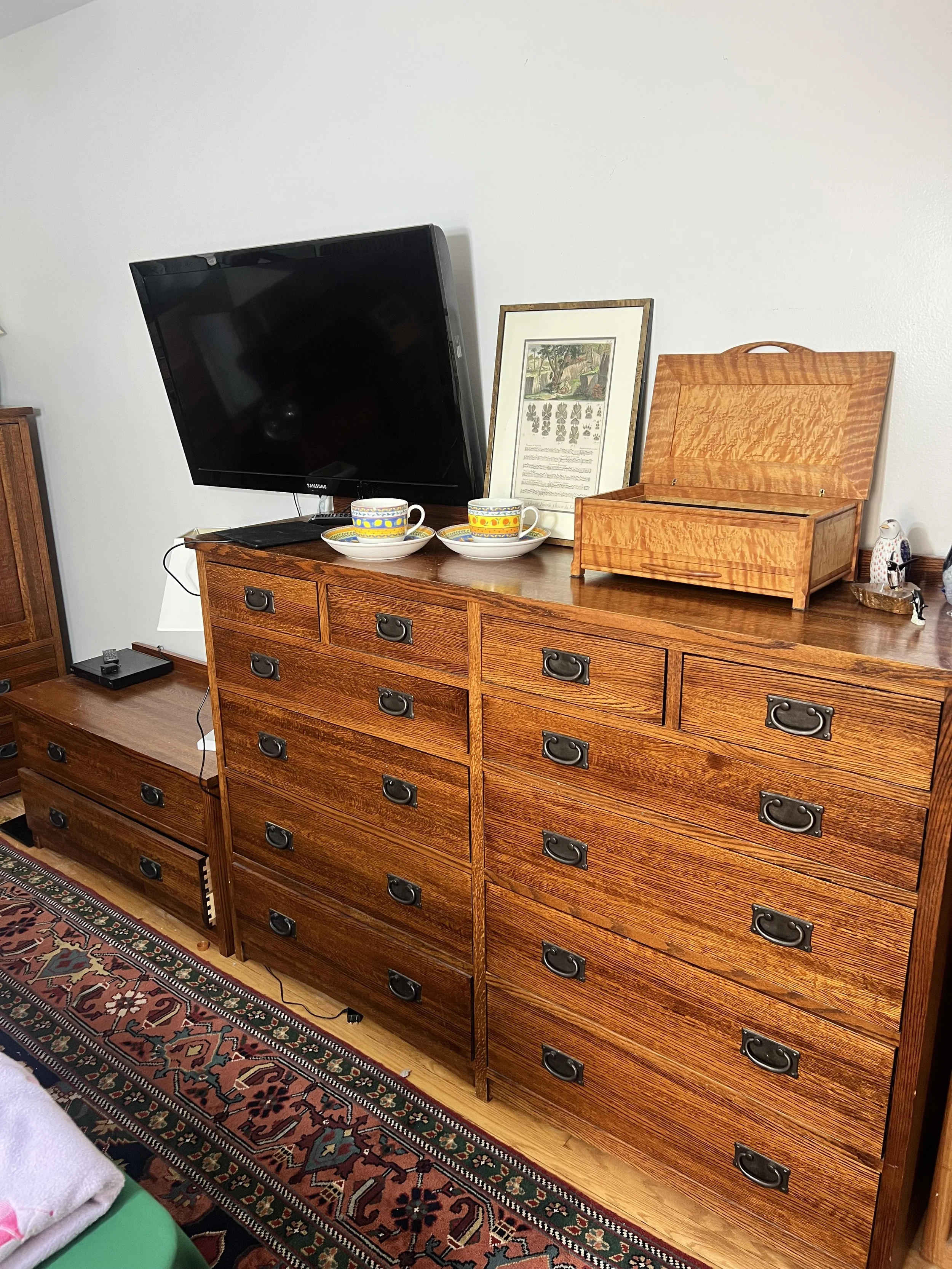 Michaels of Sacramento solid oak 12-drawer landscape dresser with matching short 2-drawer accent chest.