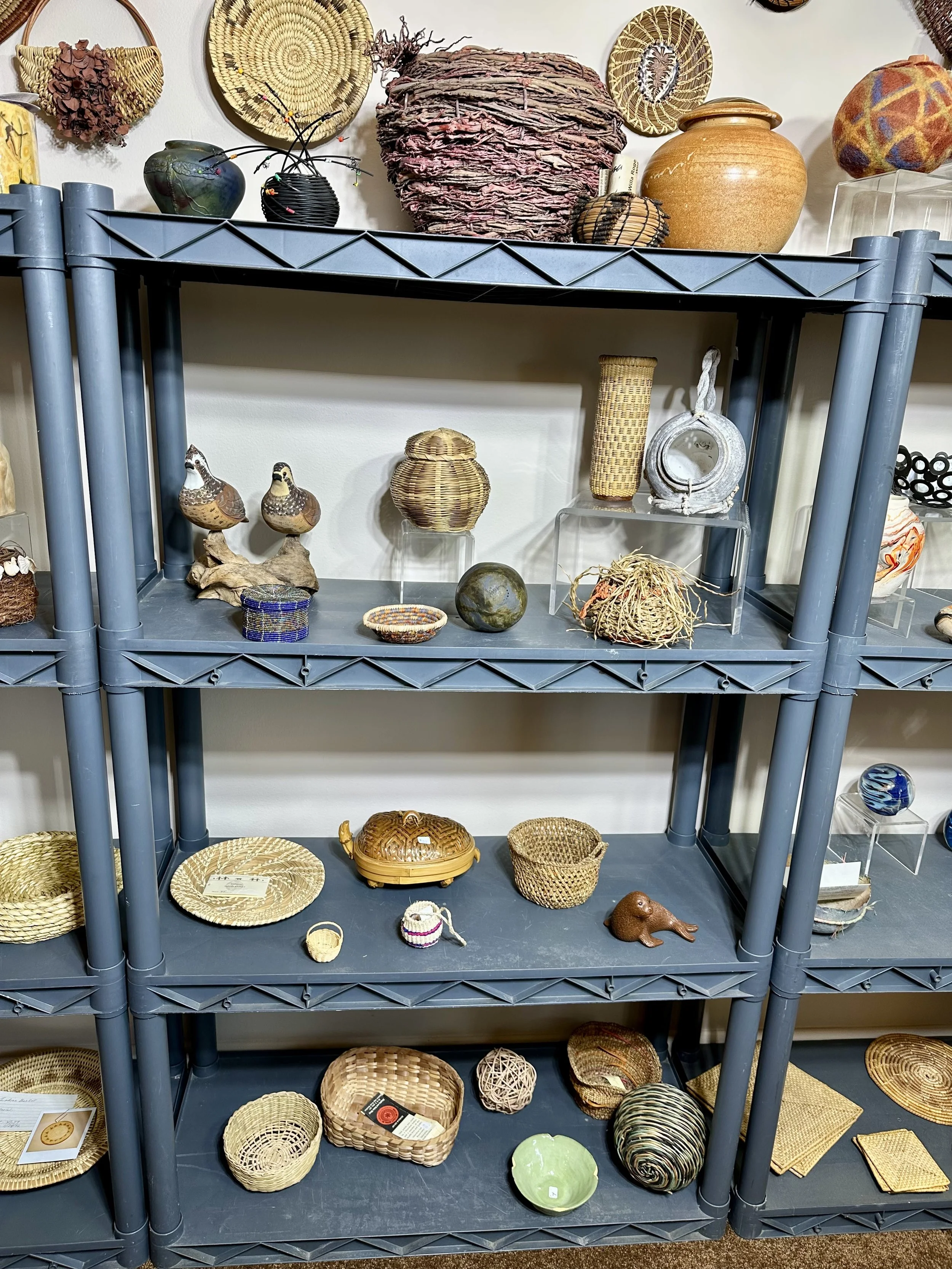 Various decorative baskets and art