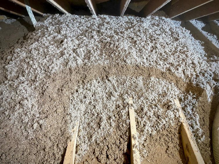 Blown in loose fill cellulose insulation