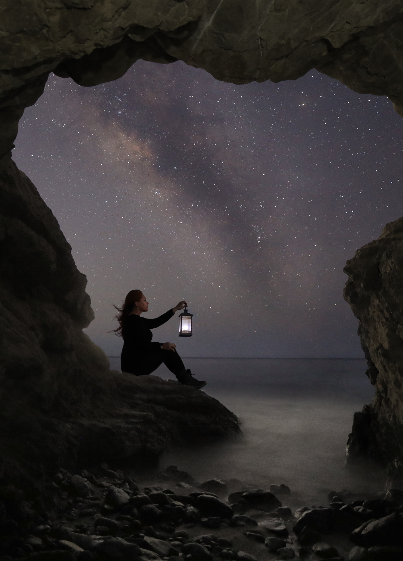 Lady in cave with lantern