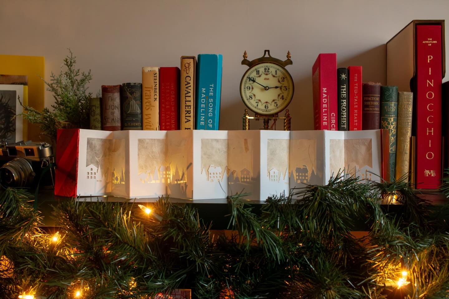I&rsquo;ll be at The Holiday Market @artcentergvl this Saturday! I have some new bookish projects that I&rsquo;ll be bringing and excited to show them off!

🏠 Christmas village concertina book with washi paper panels. Place some fairly lights behind