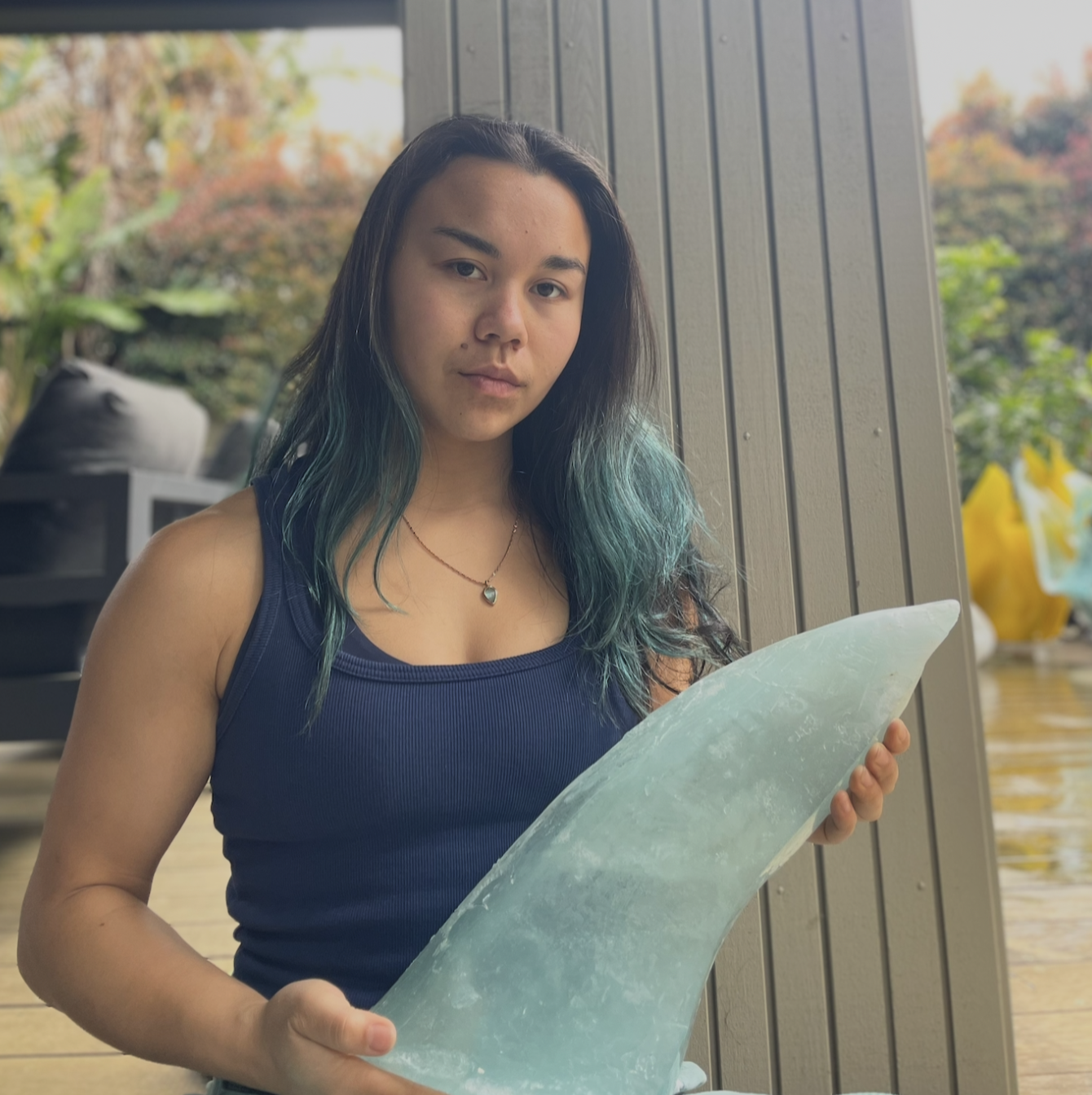 tyla holding glass.png