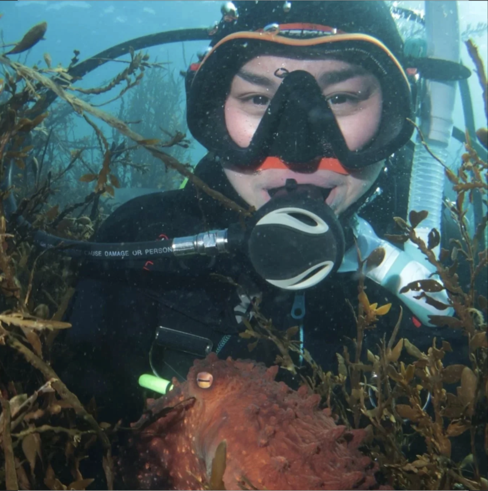 tyla underwater with octopus.png