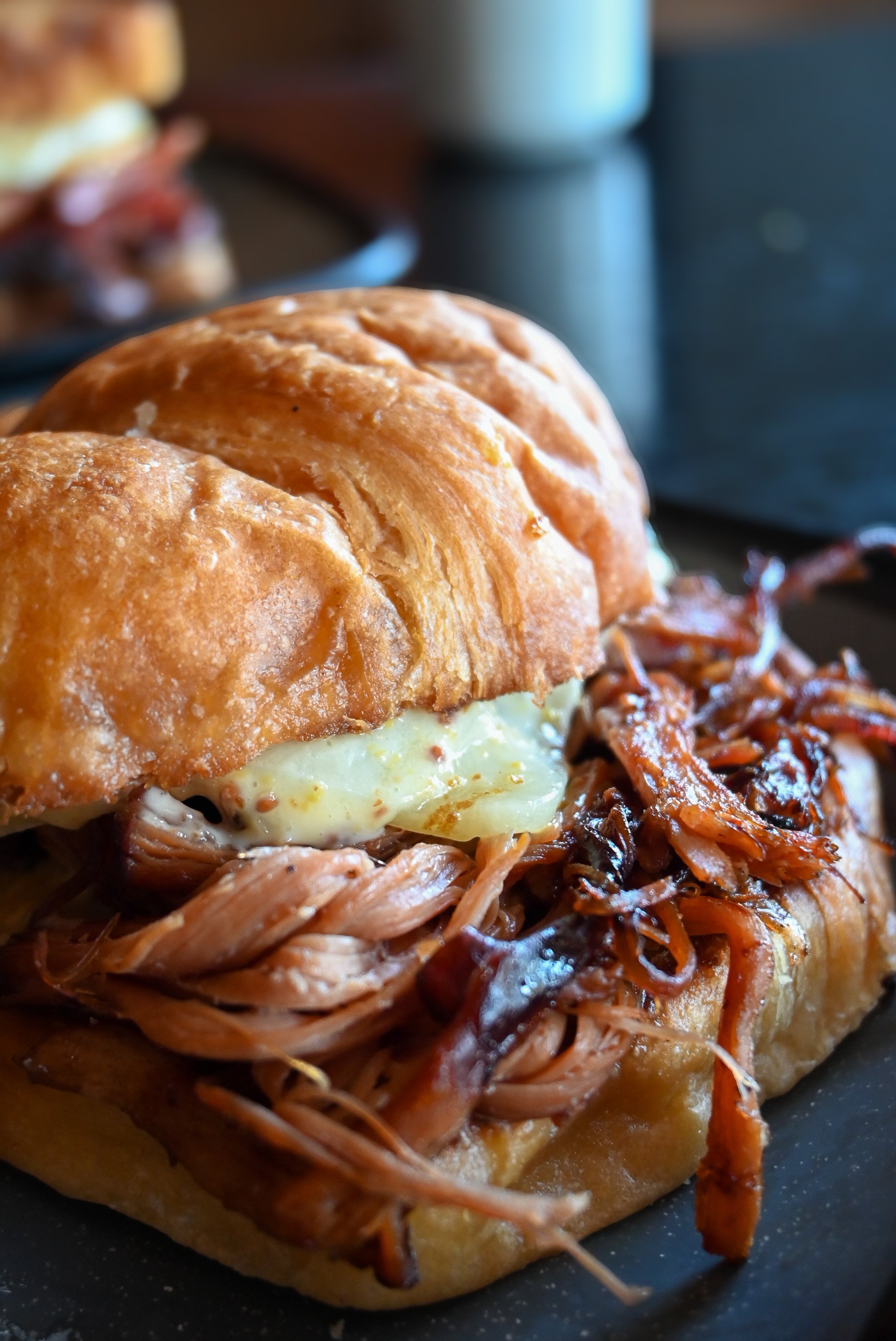 house pulled port wine ham, white cheddar cheese and mustard croissant sandwich for weekend bar brunch specials in milwaukee