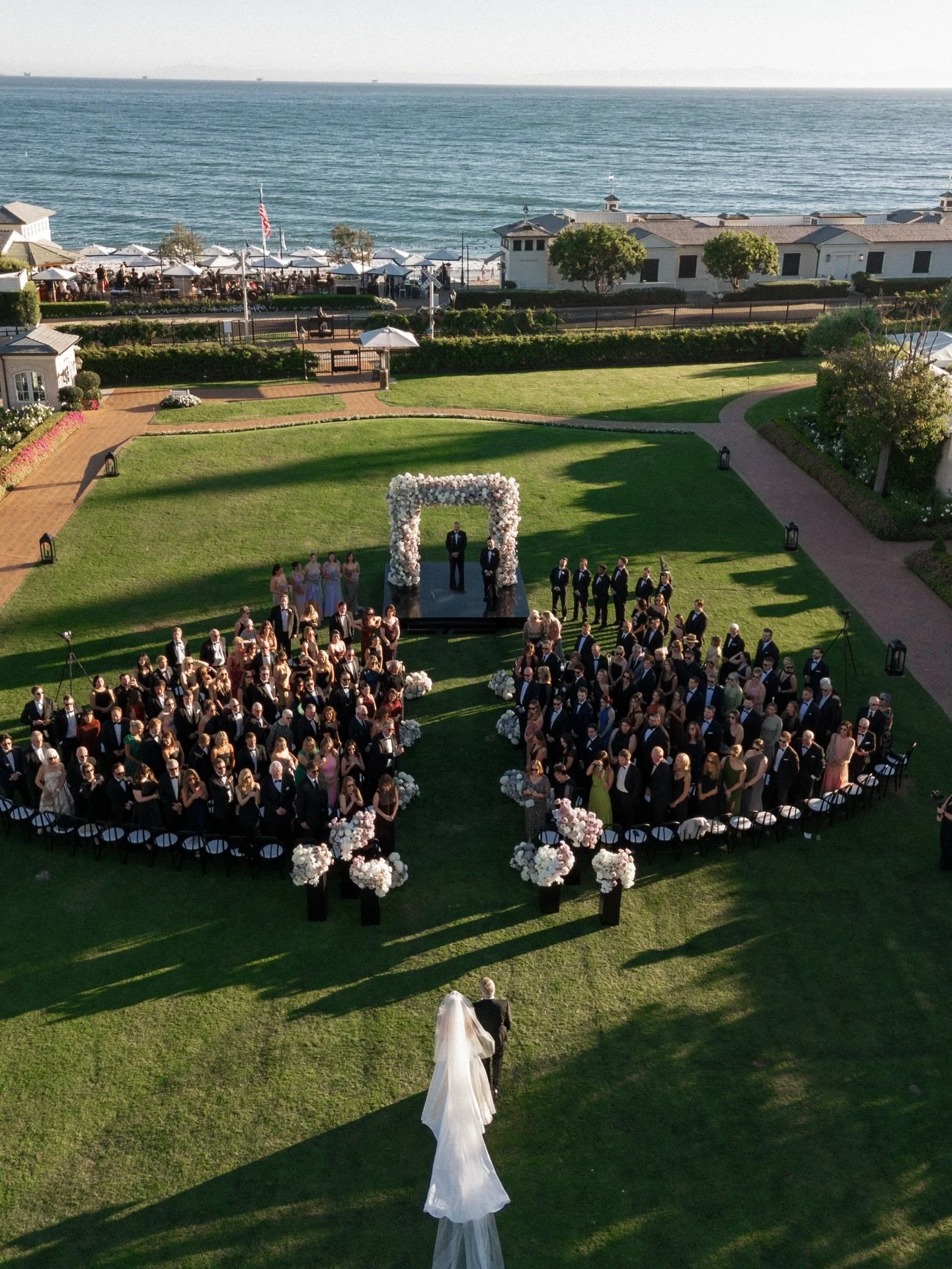 Drone shot 🙌🏻 and that just married feeling 🤍
@sterlingblum @seanharding24 🤩

Venue @rosewoodmiramarbeach
Planning &amp; Design @heatherhoesch
Photo @kristinaadamsphoto
Video @jeremyfosterfilms
Beauty @marla_hairandmakeup
Attire Styling @theonego