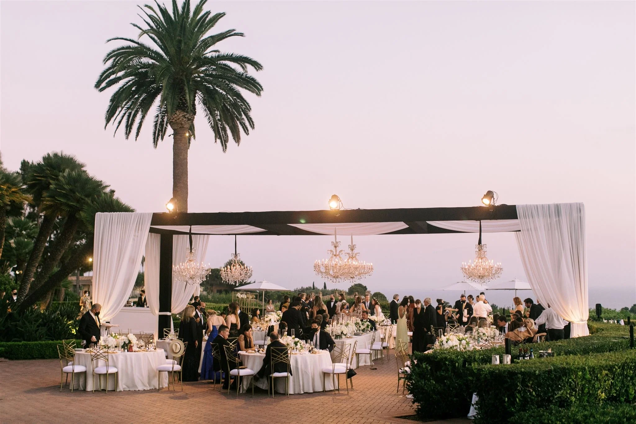 Pelican hill wedding heather hoesch events wedding reception outside.jpg