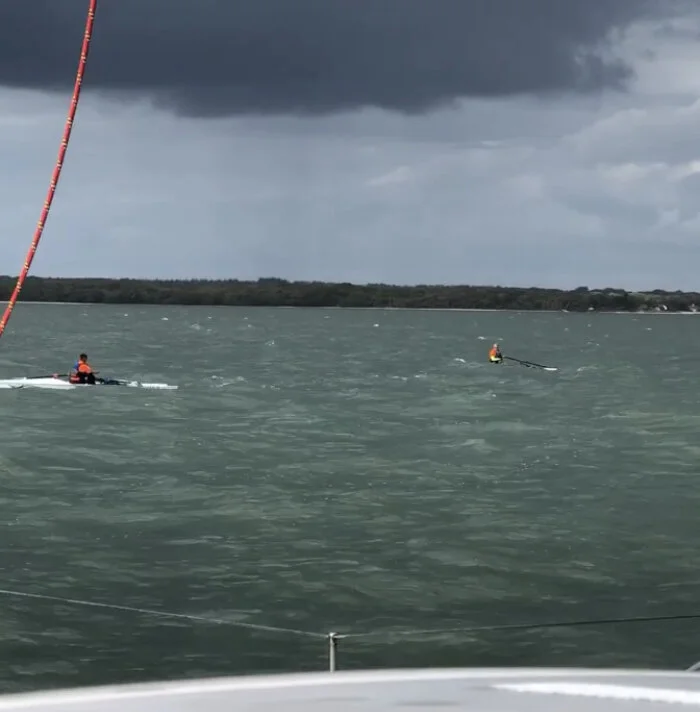 LiteRace and LiteSport in action, buoyancy aids on, support boat nearby!