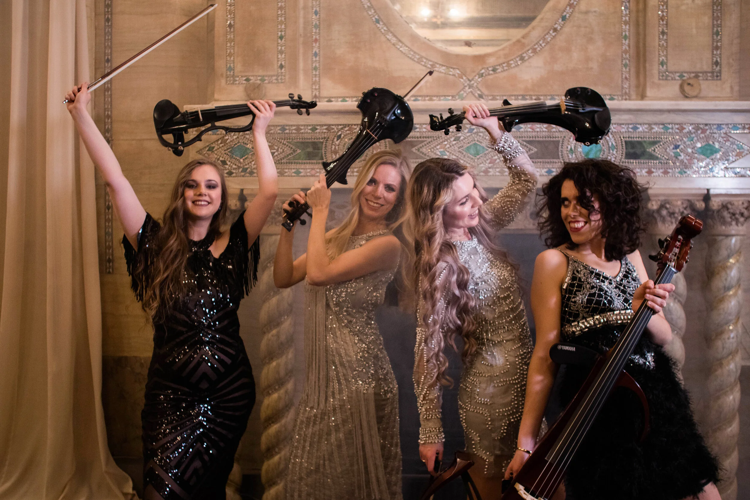 Electric string quartet performing high-energy music for a wedding, party or corporate event