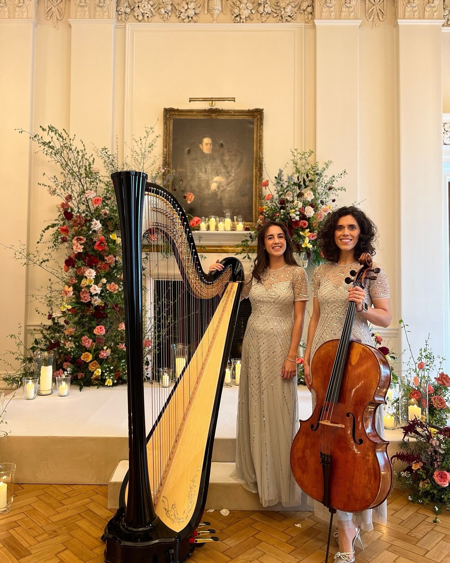 🎶✨ Dressed in harmony with a stunning backdrop at The Ned, our cello and harp duo added a touch of elegance to a magical wedding ceremony. Surrounded by exquisite floral arrangements and the warm glow of candlelight, our music filled the air, weavin