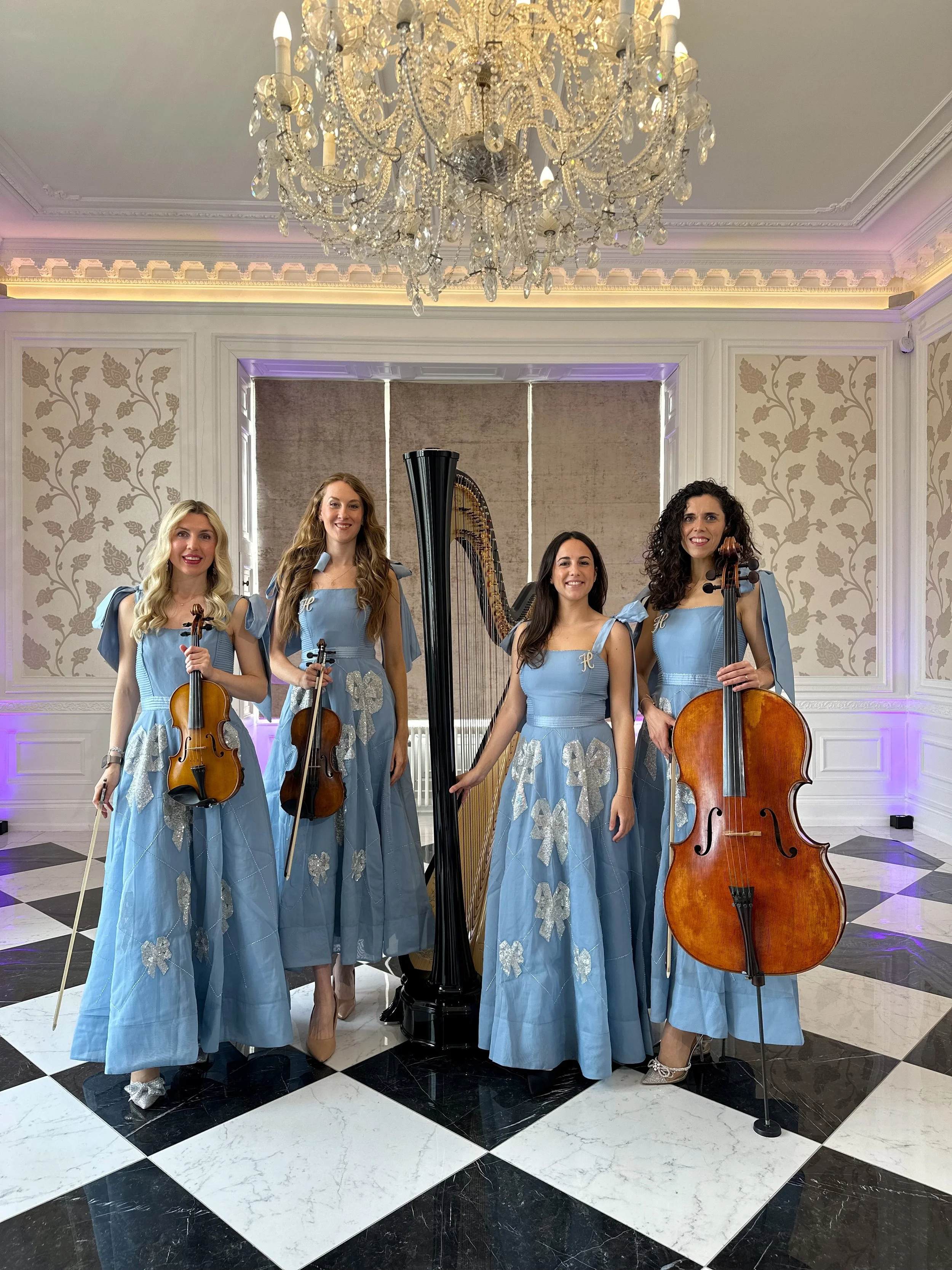 Harp and strings performing romantic wedding music for a luxury event