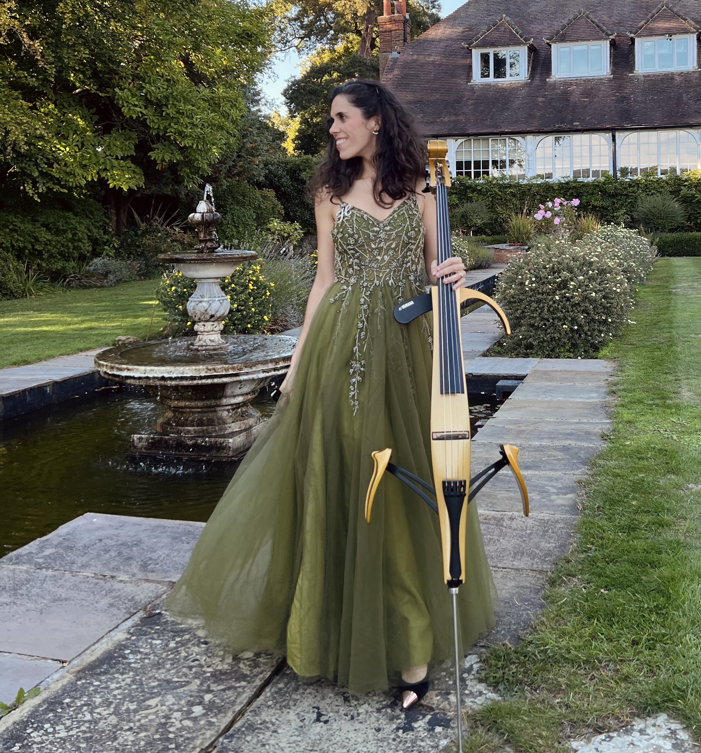 Electric cellist performing modern live music for a wedding or private event