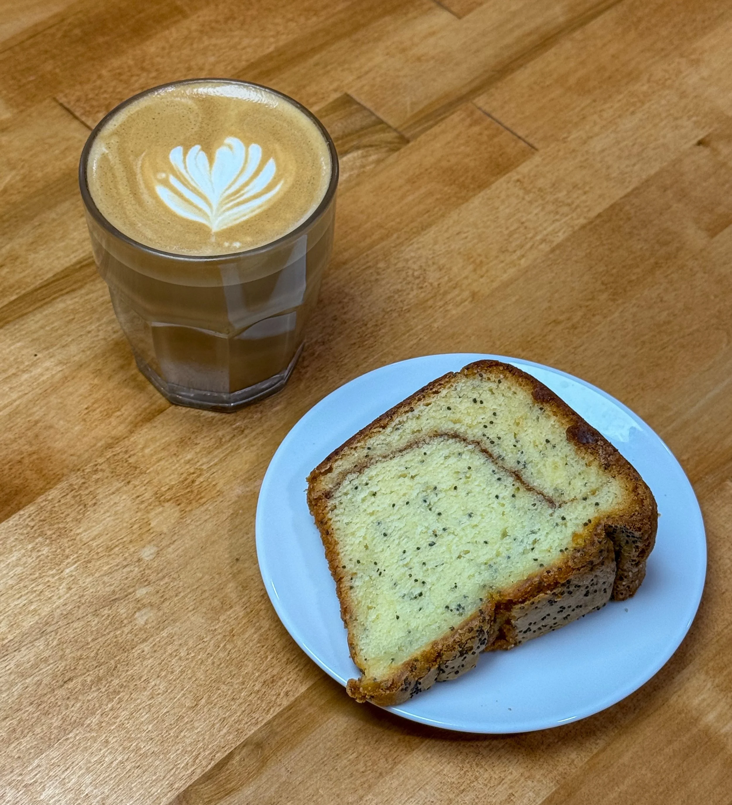 A gloomy Saturday morning calls for a cortadito and lemon poppy cake! We are open 7-2 today, see you soon. 🌦️