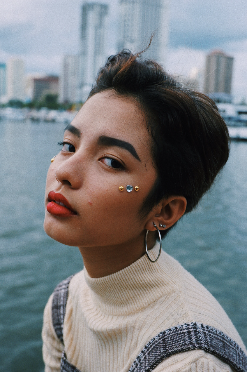 "I’m a queer, nonbinary, Asian-American femme. These days, I’m really feeling anything cozy and sparkly. I love to collect Disney pins and take portraits of my friends." –Niki (all pronouns)
