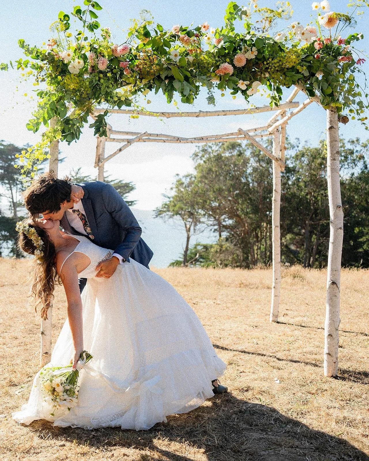 It was an absolutely gorgeous day for Nicki and Sebastian&rsquo;s wildflower inspired wedding, with the ceremony held above Tomales Bay. My favorite part has got to be her flower crown, made of blue eryngium, fennel and xeranthemum blooms.

Photograp