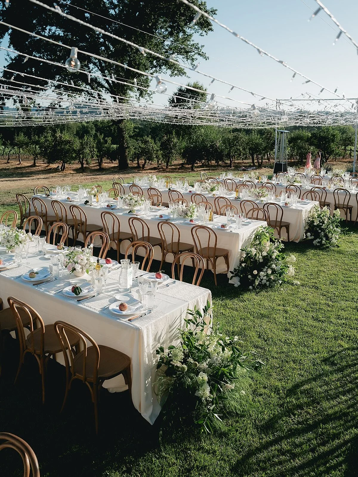 Bella &amp; Casey&rsquo;s reception was held at the groom&rsquo;s family home in Sebastopol, a former apple farm with many apple trees still producing. The apples on each place setting were grown right here! 

The day was a warm one, giving way to a 