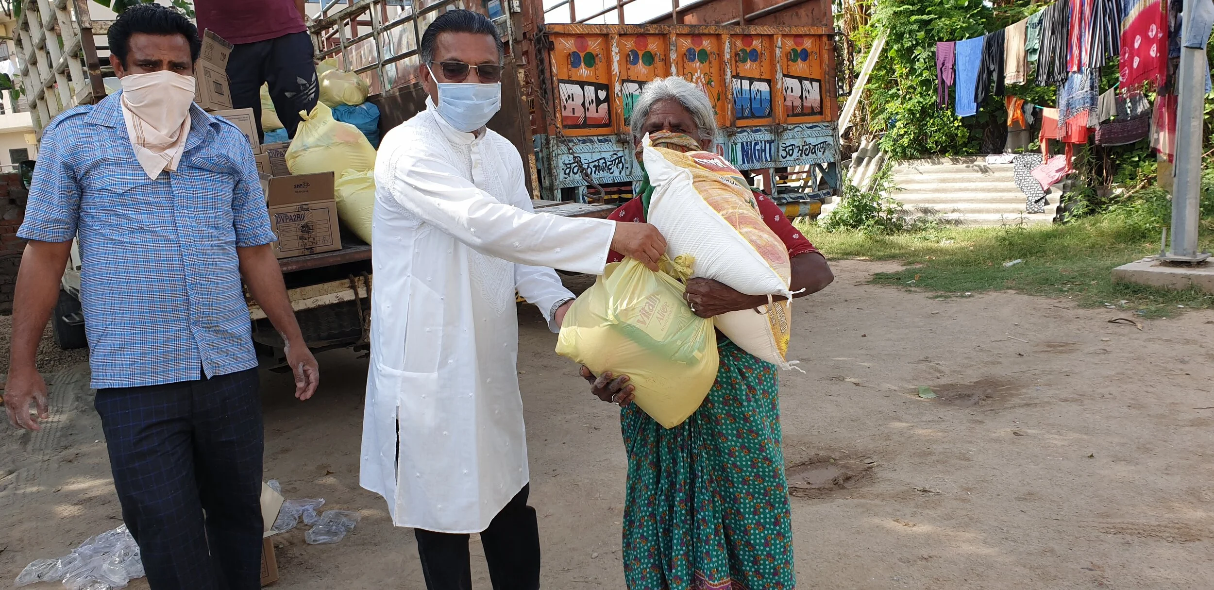 Distributing groceries among slums during the Covid-19 lockdown period in Punjab.