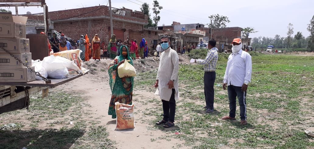 Distributing groceries among migrant daily-wage labourers during the Covid-19 lockdown period in Punjab.