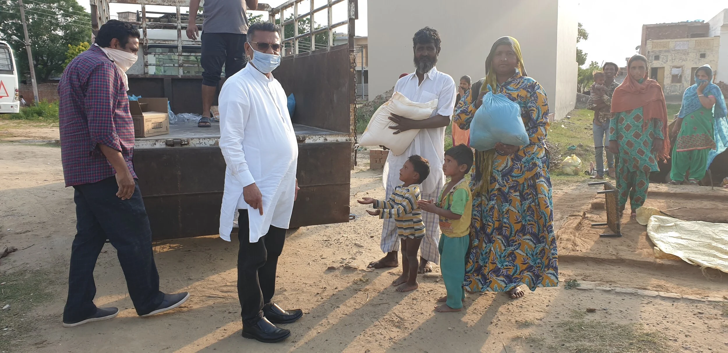 Distributing groceries among slums during the Covid-19 lockdown period in Punjab.