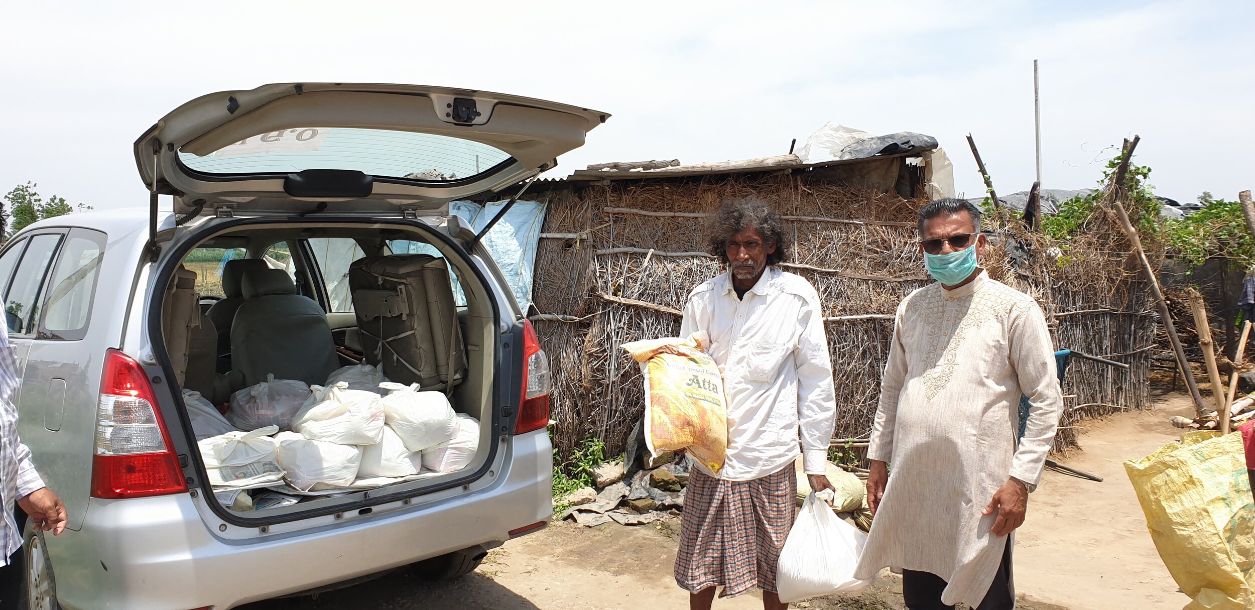 Distributing groceries among slums during the Covid-19 lockdown period in Punjab.