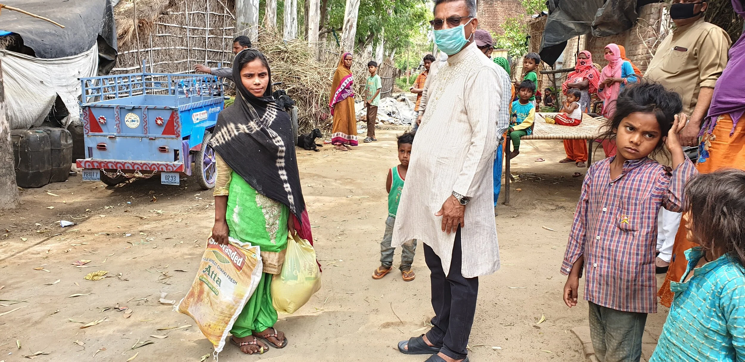 Distributing groceries among slums during the Covid-19 lockdown period in Punjab.