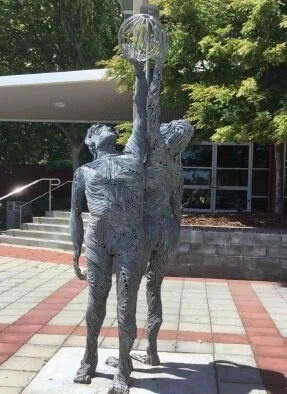 SCULPTURE OF BASKET BALLERS
