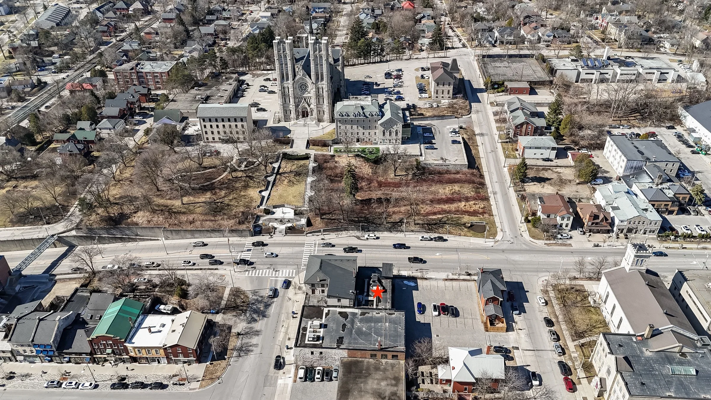 High aerial view of downtown Guelph streets, blocks and the cathedral