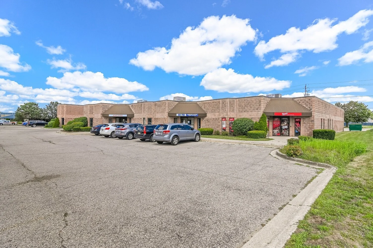 Parking lot with the building frontage in the distance at 335 Sovereign Road