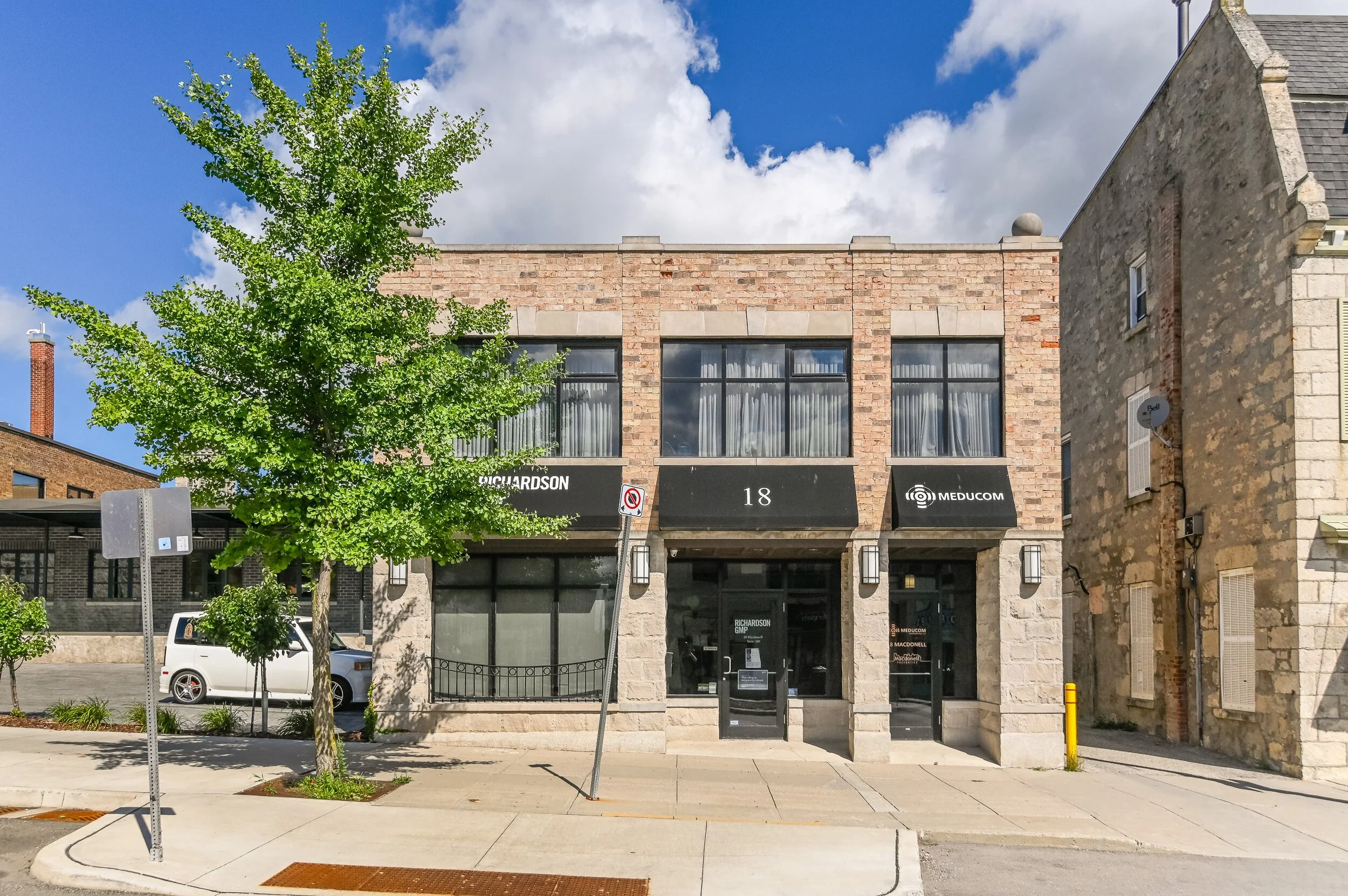 18 Macdonell Street storefront with a mature tree and sidewalk