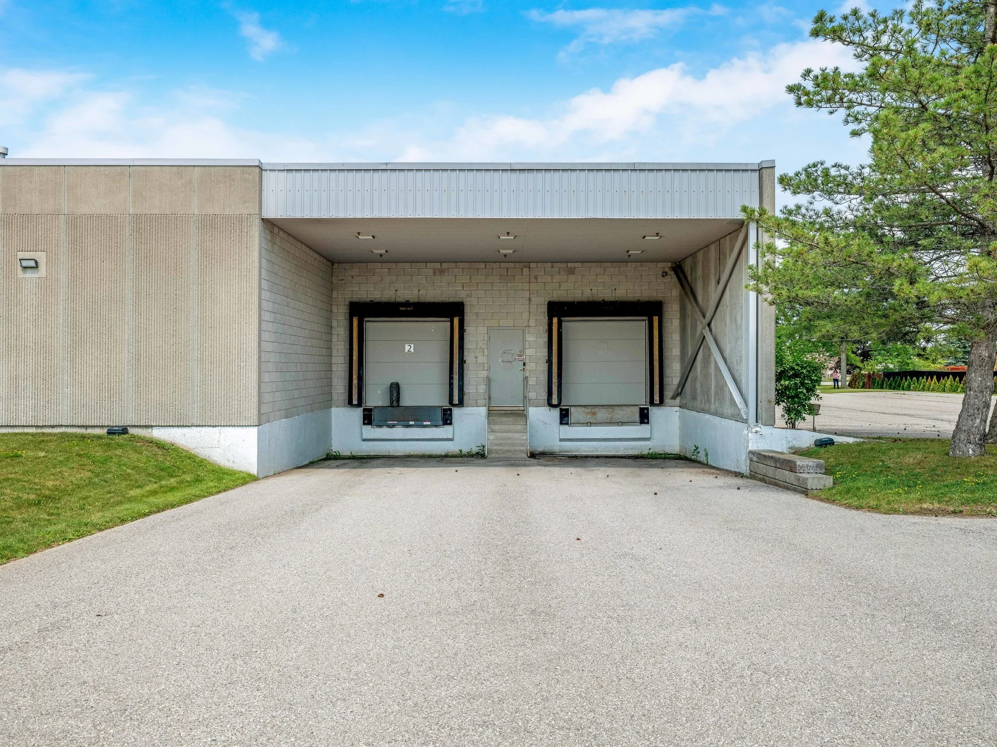 Loading area with two truck-level shipping doors at 546 Governors Road