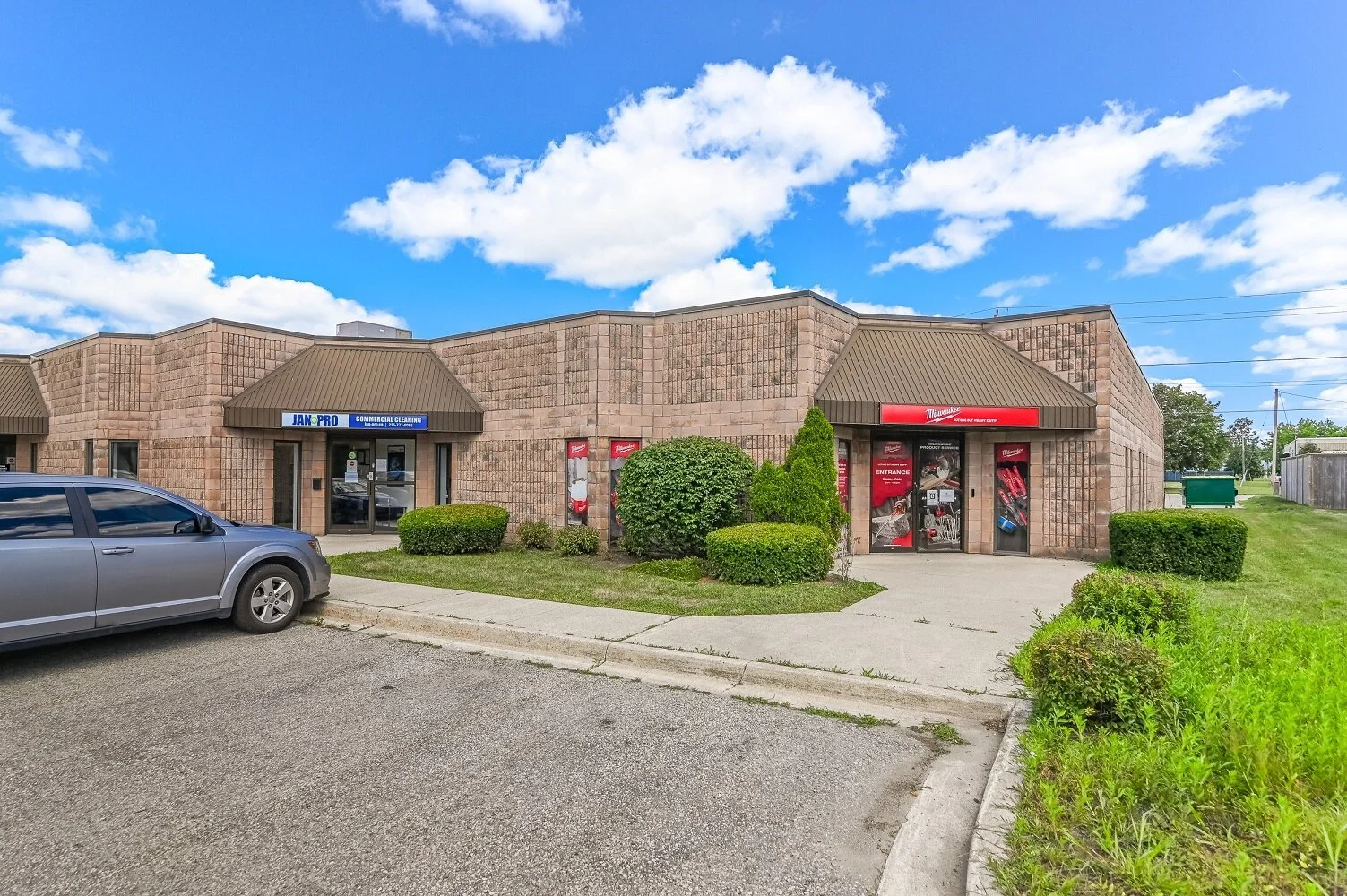 Unit entrance with an awning and parking at 335-337 Sovereign Road