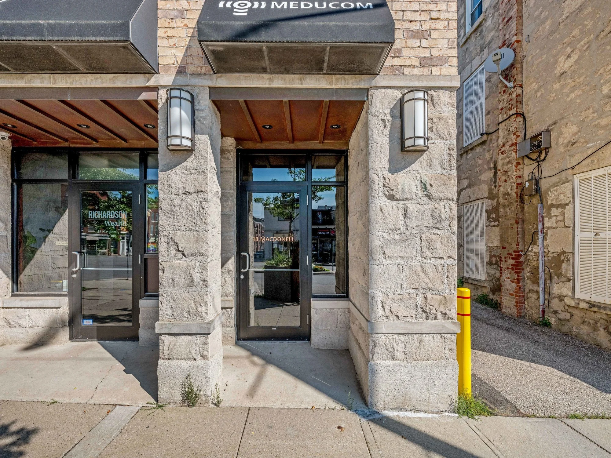 Entrance doors and awnings at 18 Macdonell Street