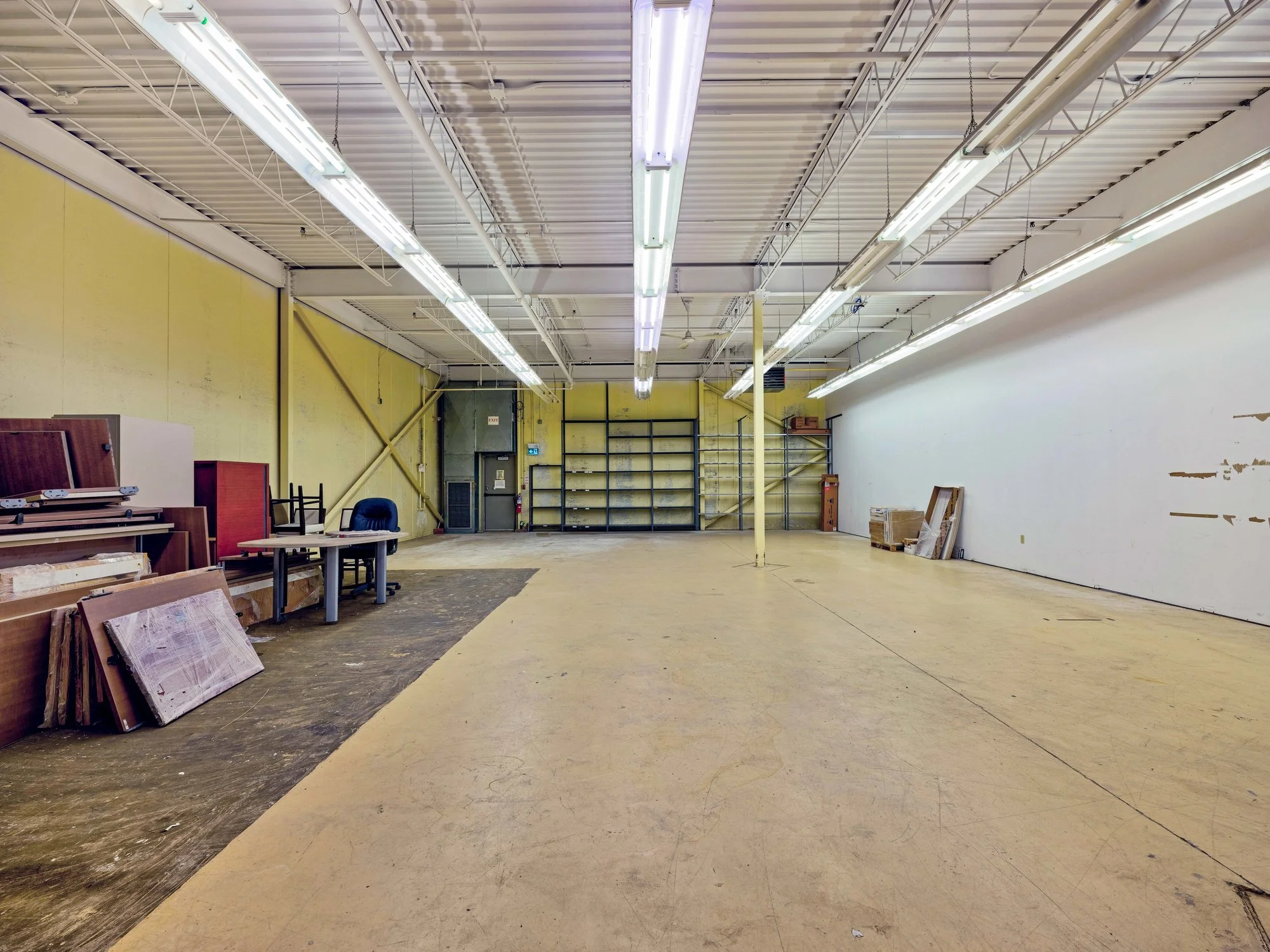 Warehouse with a glass-walled office on the side