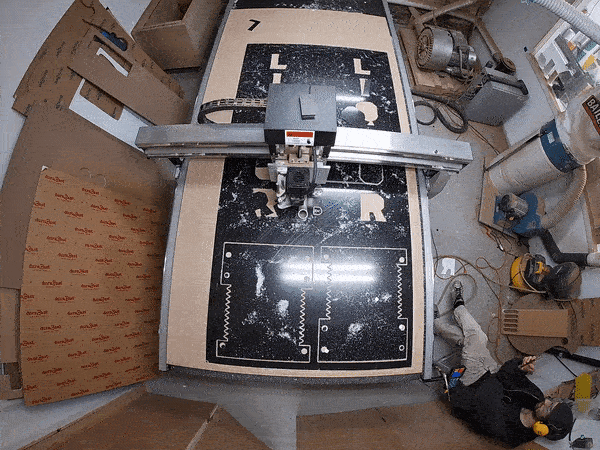 Cutting out the body panels on our CNC router