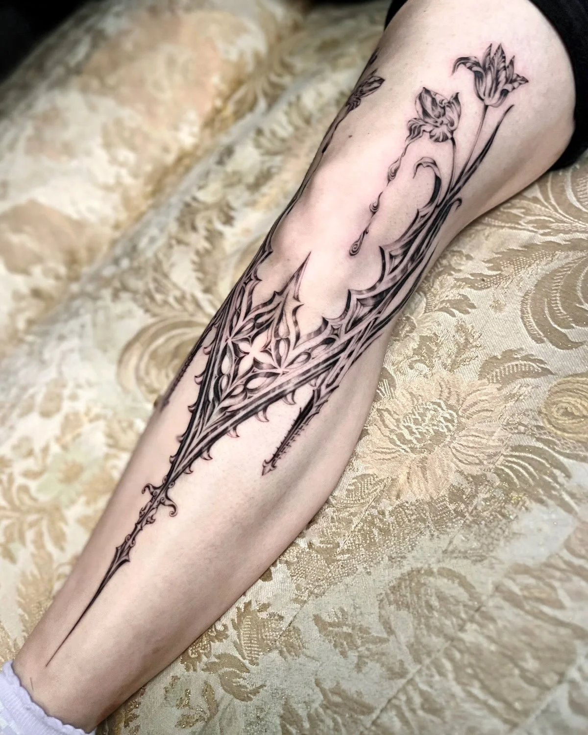Flornament for Jackie 🖤 I adore these labors of love from this series&mdash; truly, what a journey! An alchemy of nature &amp; man: Melting tulips grown from architectural whimsy. Botanical ornament framing the knee, stretching along the shins and s