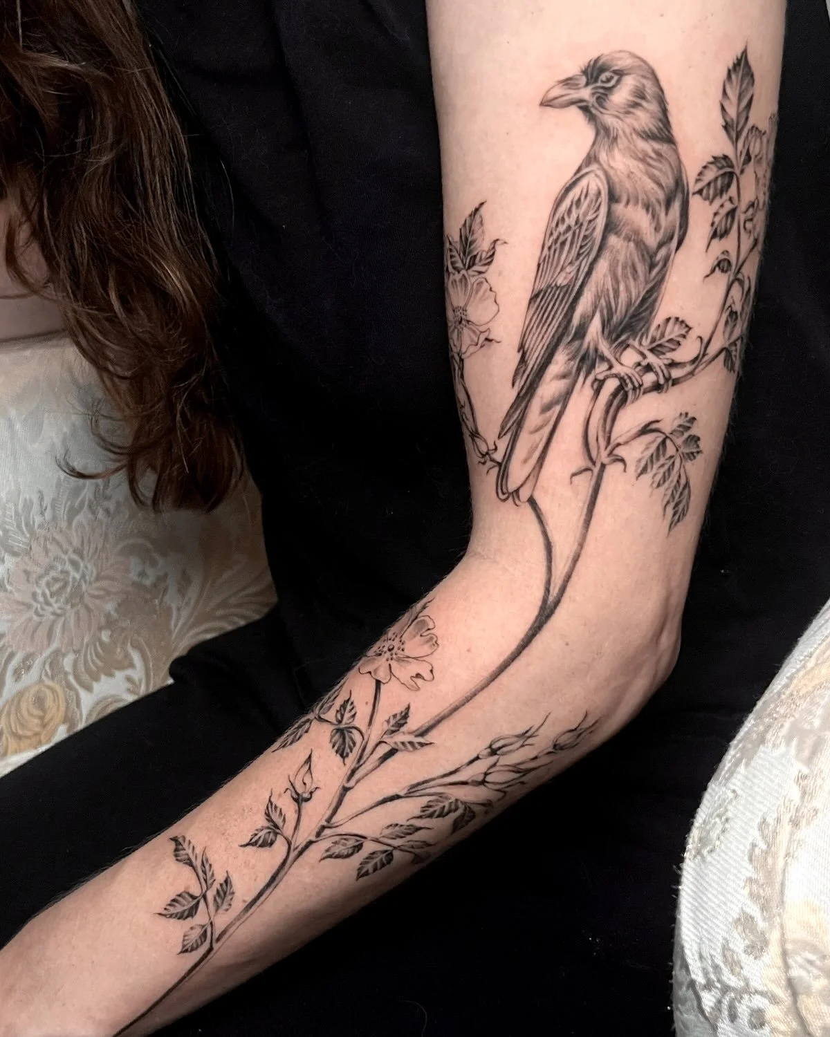 Raven &amp; Rose 🖤 stoic and patient, a keeper of cosmic wisdom perched on branching roses. For love &amp; new beginnings. Thank you so much, Hannah! I adore this design and love how it moves with your body&mdash;to being a tatty baddie ❤️&zwj;🔥!! 