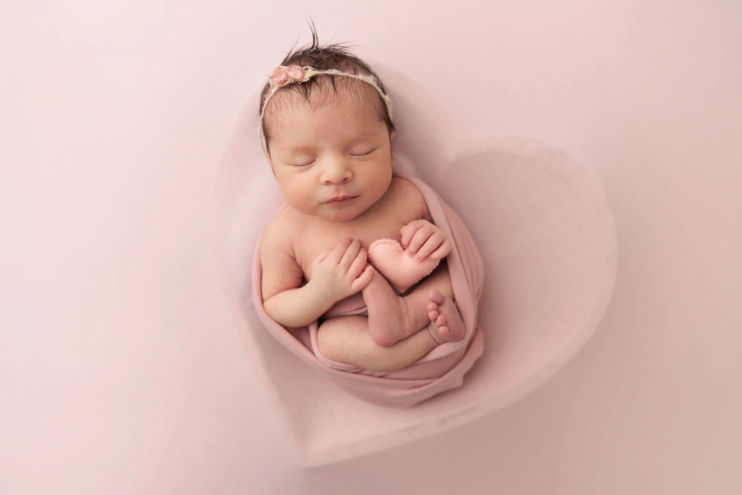 baby wrapped in pink heart heart bowl