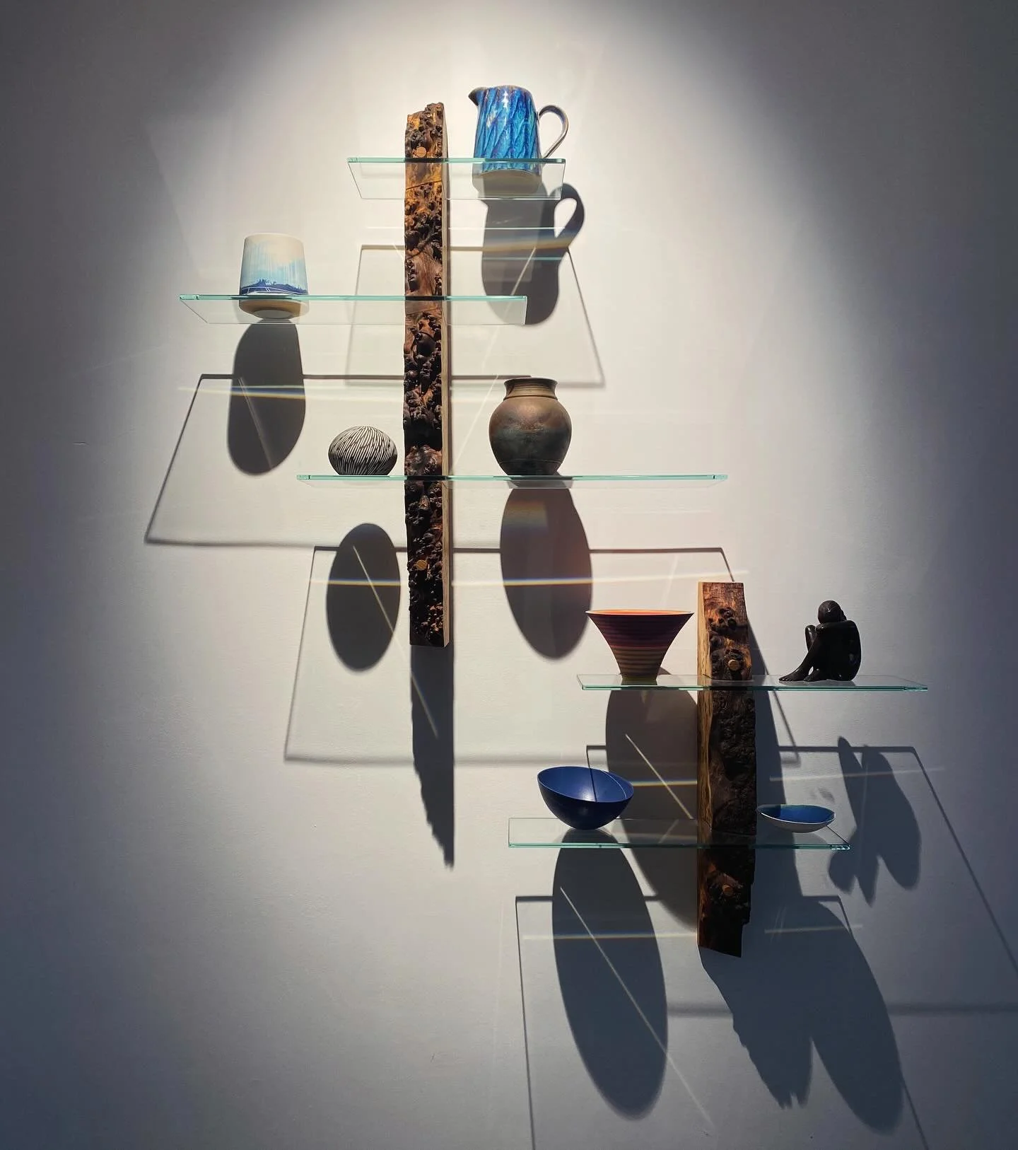 We went to go see a client from earlier in the year about a new project and caught sight of one piece we made for them previously - how amazing do these oak and glass shelves look now with the beautiful collection of ceramics in place..! And the shad