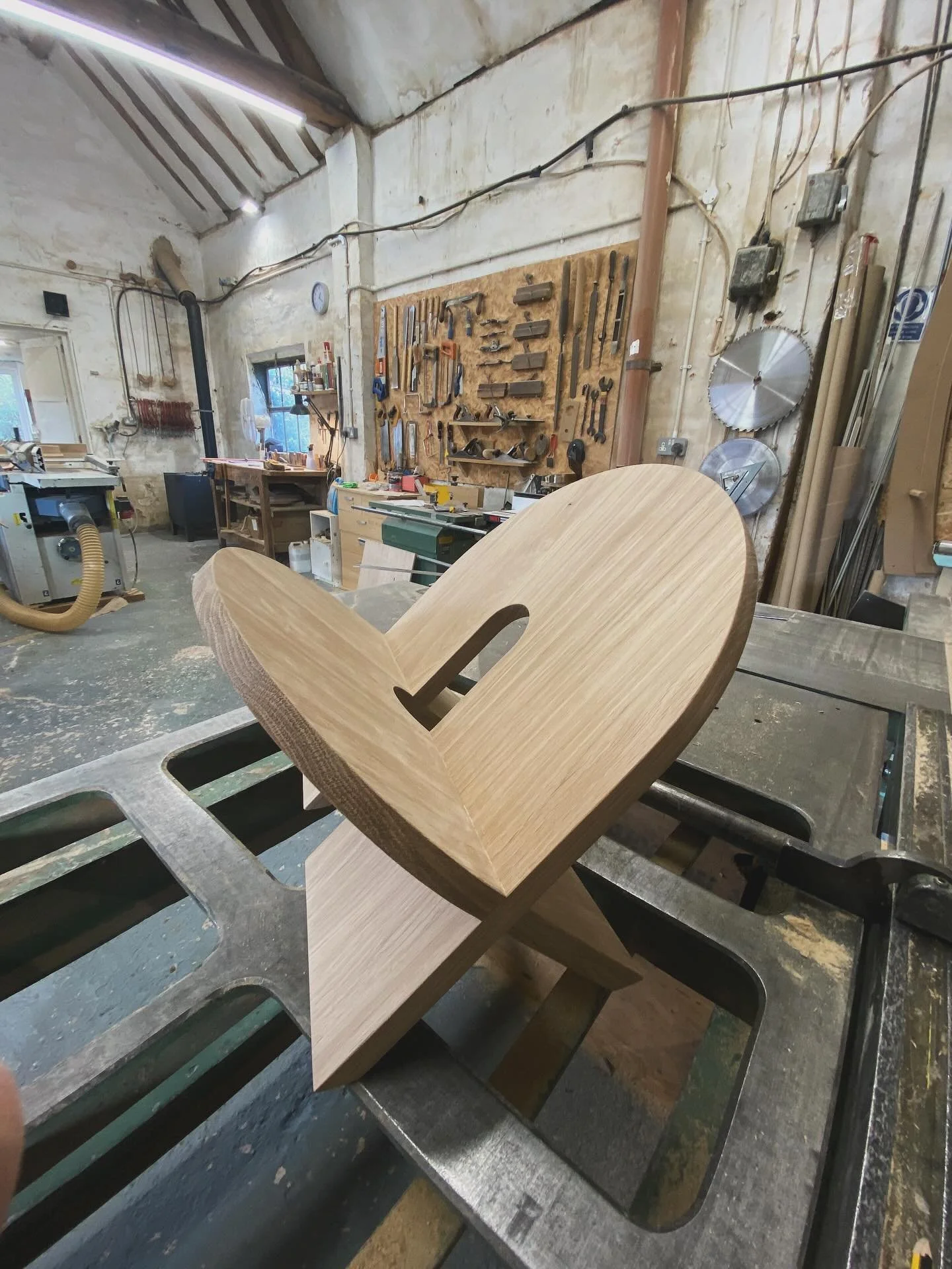 Another piece hot of the sanders, this beautiful little magazine rack was ordered by a previous client. A lovely open brief so we decided to keep it curvy with two intersecting circular oak planks to support the magazines. Who says print is dead..!

